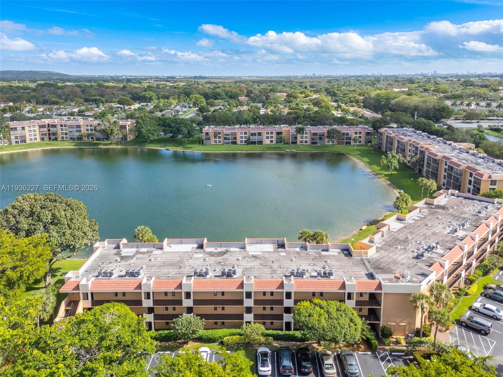 Tired of cold winters and snow-covered automobiles? Then this beautiful 2-bedroom, 2-bathroom room apartment with a screened-in porch is the unit for you. If you are looking to establish residency in Florida, this is a perfect opportunity for your tax shelter. The building and community are well-kept and provide 3 pools along with an amazing social program for the residents.  If you are looking for an AARP single-scene, this is the unit for you. 20 mins from the beach and 20 minutes from the Everglades. The unit has a new A/C, and the building is solid concrete block hurricane-proof construction. Close to Publix, Target, and amazing restaurants. Make an offer and take advantage of this Florida gem.