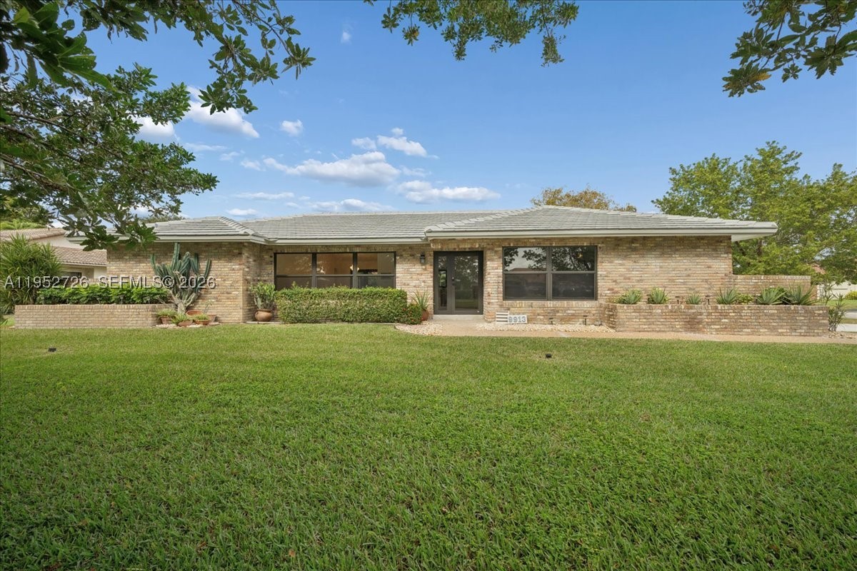 Beautiful 5-bedroom, 2-bath home in the desirable Oakwood community of Coral Springs. Featuring a brand-new roof, fully renovated kitchen and bathrooms, lifetime-warranty laminate flooring, and fresh paint throughout. This smart home includes impact windows and doors, new appliances, and a 2-car garage. Enjoy a screened-in pool on a spacious corner lot—perfect for entertaining. No HOA and no restrictions, offering flexibility for homeowners or investors. Conveniently located near schools, shopping, dining, and major highways.
