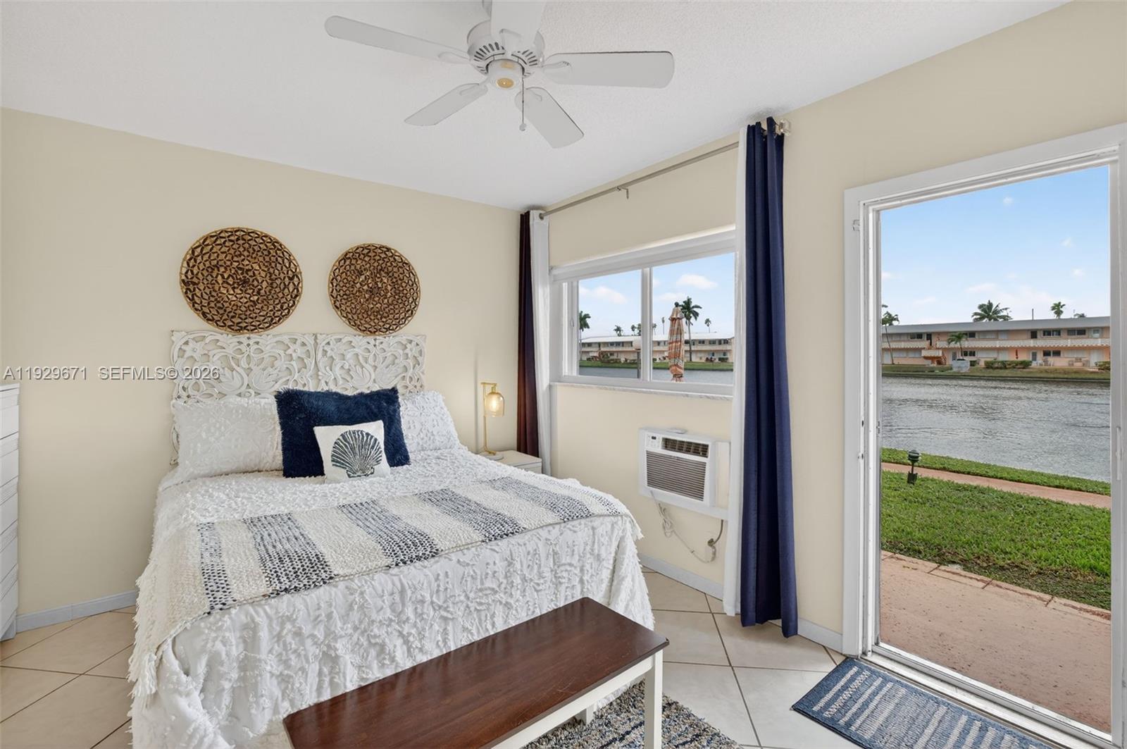 Beautifully remodeled unit with 1 bedroom, and 1 bathroom in a prime lakefront location within Rolen Lake. Ideally situated next to the clubhouse, this unit offers some of the best views in the community and is just steps from the pool. Light, bright, and inviting, the home features serene lake views directly from the bedroom and stunning waterfront scenery right outside the back door. The open-concept kitchen is designed for both function and entertaining, featuring abundant cabinetry extending to the ceiling, providing lots of storage, along with quartz countertops and a welcoming layout. The unit is fully furnished and tastefully decorated—truly turnkey and all-inclusive. Additional highlights include a stylish wood-accent wall in the living room, impact windows throughout, a full-size washer and dryer inside the unit, bedroom A/C plus mini-split in the living area. Located in a well-maintained, HOPA-verified community offering resort-style amenities such as a sparkling waterfront pool, BBQ area, shuffleboard, billiards, fitness center, and community room. Conveniently close to beaches, shopping, dining, and major highways. This is the perfect blend of comfort, convenience, and Florida living at its finest.