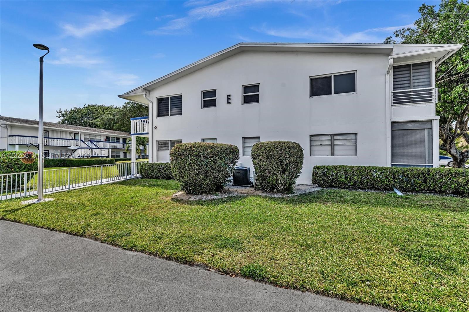 RARE OPPORTUNITY IN 55+ CENTURY VILLAGE! Welcome to this charming, beautifully maintained 2-bedroom, 1.5-bath condo. A warm, inviting space that feels instantly like home. Light, cozy, and cared for with true pride, this unit is the perfect blend of comfort and convenience. Ideally located steps from the main gate and walking distance to houses of worship, community attractions, and daily essentials, this condo offers one of the most desirable locations in all of Century Village. If you’ve been waiting for a clean, well-kept, perfectly situated home in this community… this is the one.