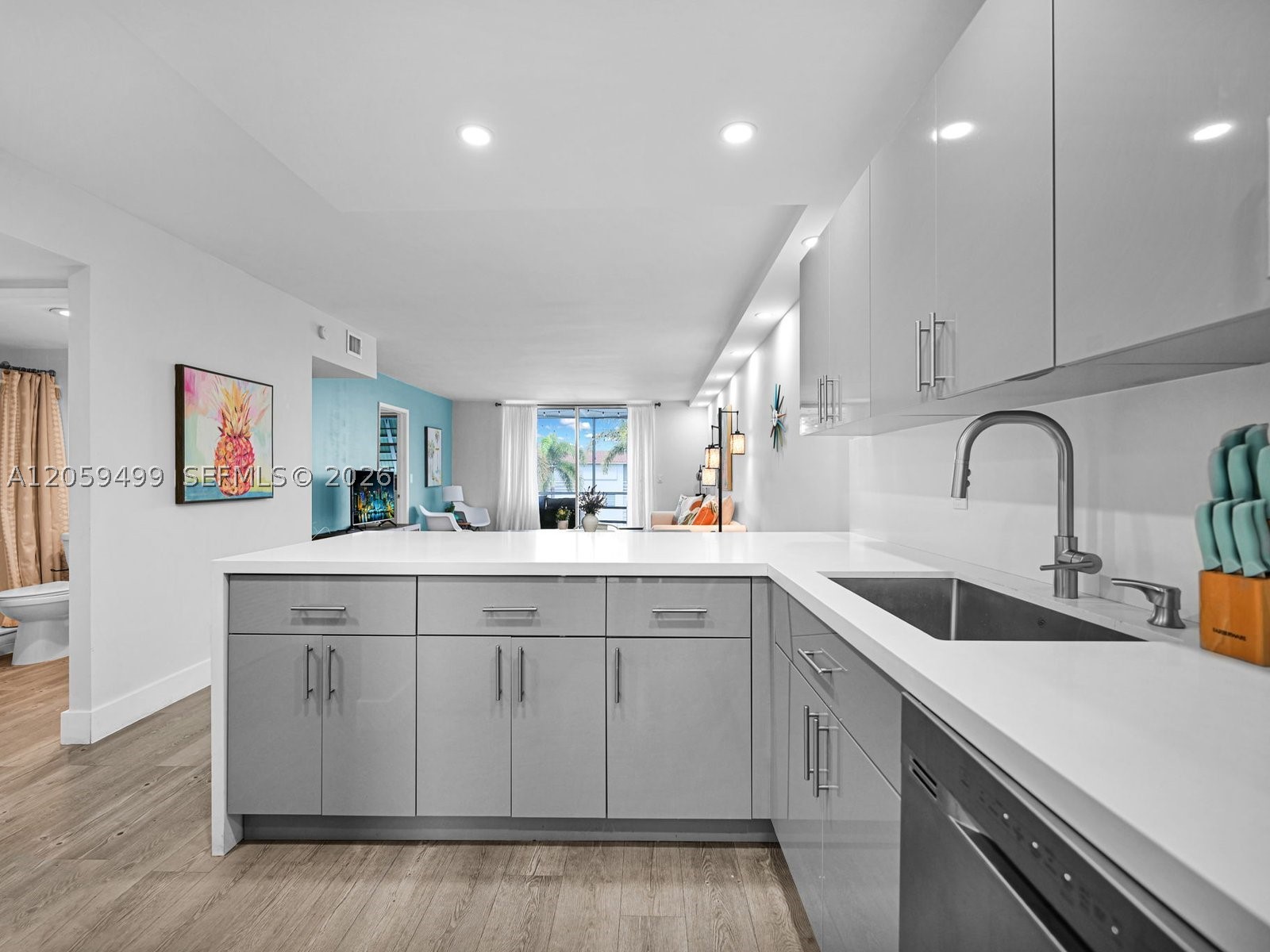 Experience coastal living at its finest in this completely remodeled gem! This beautifully finished condo boasts stylish upgrades throughout, offering a serene escape with breathtaking views from your screened-in balcony overlooking the sparkling pool. Nestled in a quiet, well-maintained community near Federal Highway, you're just minutes from the ocean, trendy restaurants, and premier shopping destinations. The open floor plan creates a bright and inviting space perfect for entertaining or relaxing after a day at the beach. With everything move-in ready, this home is the best deal on the market—your dream lifestyle awaits!