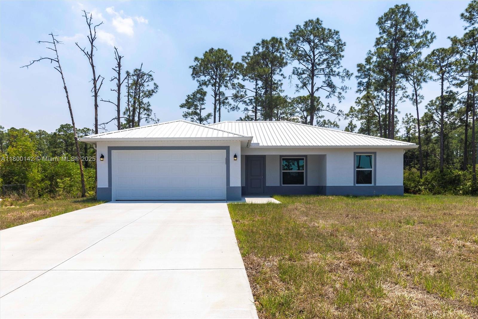 Brand new construction and seller financing available! This stunning 3-bedroom, 2-bathroom home features a bright open floor plan with vaulted ceilings, modern finishes, and high-end details throughout. The kitchen boasts granite countertops, stainless steel appliances, and soft-close cabinetry. Enjoy a spacious primary suite with a walk-in closet and luxurious en-suite bathroom. With impact windows, a two-car garage, and a large yard with room for a pool, this home offers the perfect blend of style and functionality. Located on a quiet cul-de-sac street in up-and-coming Lehigh Acres. Ready to move in! Contact us for additional information about financing terms.