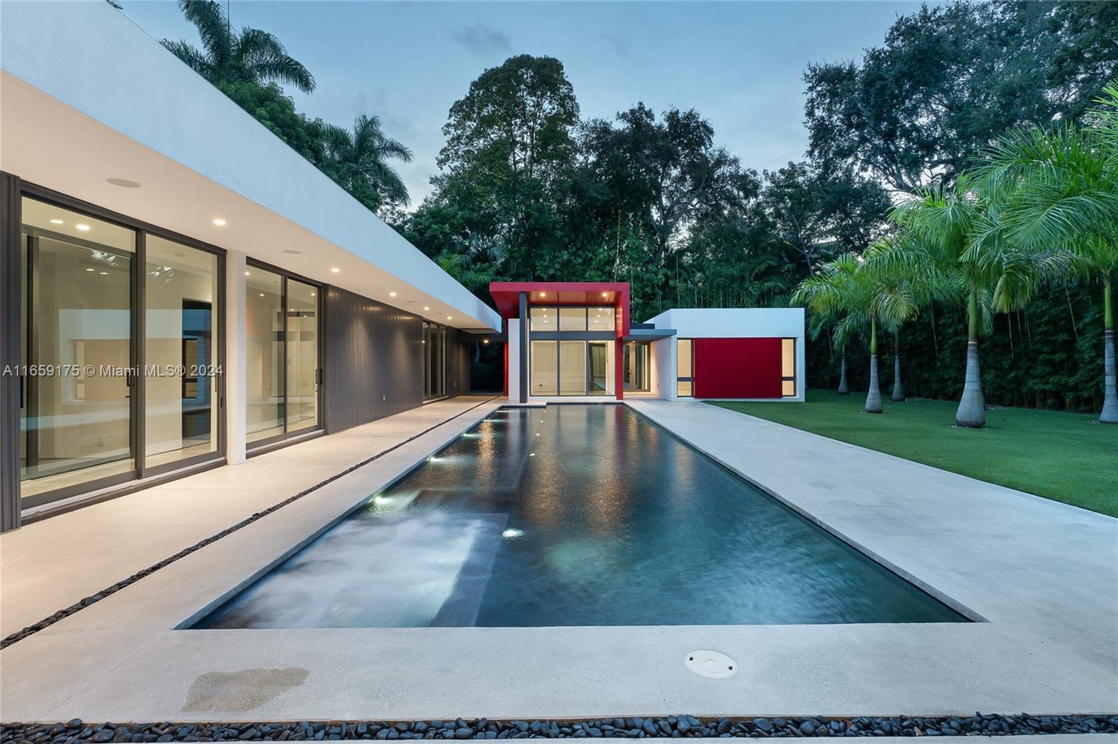 Available for immediate occupancy. Completed in 2022, this one story masterpiece with 5265 adj. sqft. sits on a 19,500 sq. ft. lot in North Coconut Grove. This estate is comprised of a Main house with 3 bedrooms plus gym, and 3.5 baths. Guest cottage has 2 rooms, plus bath, designed and wired for Home theater, plus guest suite. All Entertaining rooms have 14 Ft ceilings. 18 X 37 Great room and sep. Fam. Room overlook the 15 X 60 Ft. Lap/Spa saltwater pool. 2 room Master suite with 15 X 9 walk in closet. 4 car air-conditioned garage with 4 Tesla Power walls, 77 solar panels, 1000 gallon Propane tank, all gas chef’s kit. 3 blocks to Ransom Everglades school. Roughed in plumbing, electrical, and gas for outdoor Summer kitchen