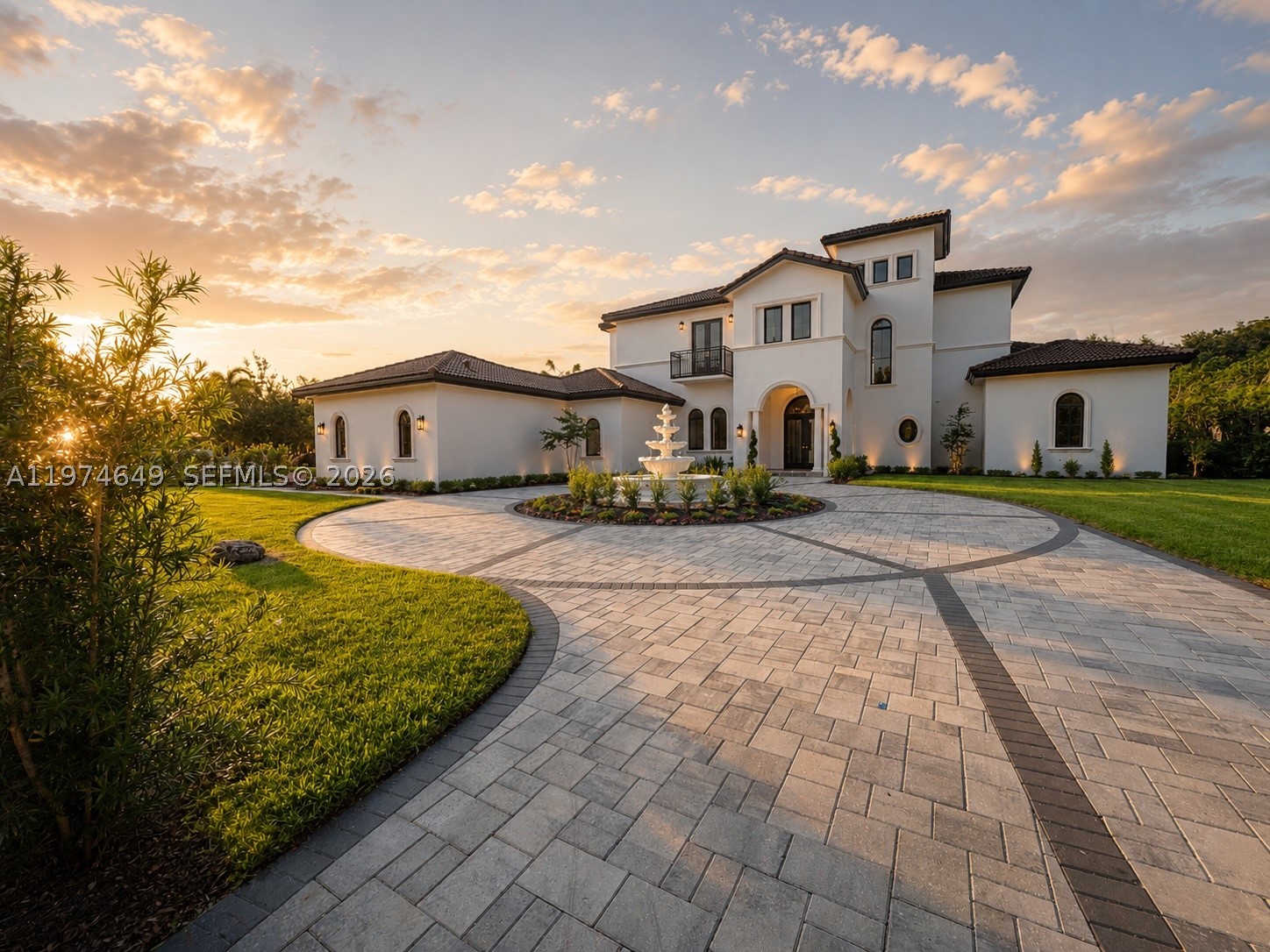Remarkable new, 6-bdrm, 7-baths, 2 half-bath luxury estate designed for grand entertaining and refined living. This home showcases premium finishes. The chef’s kitchen features Sub-Zero and Wolf appliances, including a 48” French door refrigerator, double convection ovens, induction cooktop, microwave, and glass wall hood. Grand foyer with mosaic flooring welcomes you into the home’s refined interiors. The great room features a fireplace, custom built-ins, large picture windows and surround sound pre-wiring. Highlights include an entertainment lounge with bar and wine display, formal dining room connected by an art gallery passageway, and a walk-in pantry with French doors, abundant storage, and second refrigerator.  The luxurious primary suite offers separate his-and-hers bathrooms, walk-in closets and a great window view to the Zen garden area and pool. A grand staircase with chandelier lift and a two-level traction elevator provide access between floors.The upper level features four ensuite bedrooms, each with private bath and walk-in closet, plus a loft with balcony overlooking the pool and terrace. A private guest suite on the main level adds flexibility for visitors. Outdoor living includes a summer kitchen, fireplace for wood or charcoal cooking, and expansive terrace. Additional features include two laundry rooms, climate-controlled IT closet, whole-home Wi-Fi wiring, abundant storage, and a 4-car garage, new landscaping  and a circular driveway and water feature.