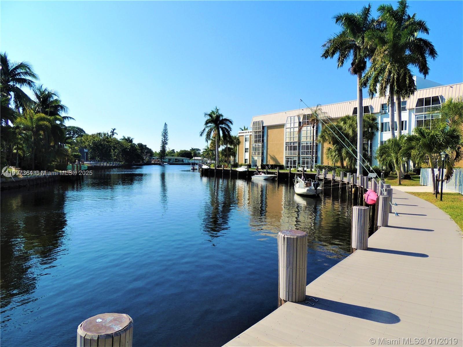 Beautiful 1Bed/1Bath apartment in River Shores community at Oakland Park. This topfloor unit features ceramic tile flooring throughout, a spacious bedroom with a walk-in closet, and a screened balcony perfect for enjoying the peaceful surroundings. The bright and open layout offer a comfortable living space filled with natural light. Fantastic amenities including a pool area, tennis court, fitness center, BBQ area, and dock available (first come, first serve). The unit also offers extra storage and hurricane shutters. Excellent Location Close to Downtown & Riverwalk, walking distance to Coral Ridge Mall, only 5 minutes to the beach and I-95, and 25 minutes to Fort Lauderdale Airport. A great opportunity for investors - No rental restrictions.