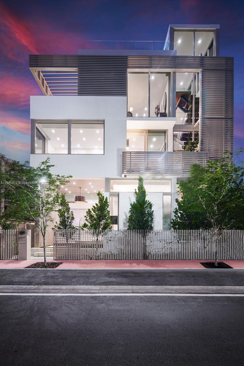 In a league of its own: Completed in 2021, this tropical modern South of Fifth single family home has no parallel. Conceived by renowned architecture firm Choeff Levy Fischman, the sculptural staircase, natural light and design aesthetics truly impress. With 3 bedrooms + gallery/media, 5 baths, this house boasts 10’ ceilings. Take the elevator to the 1,250SF rooftop complete with a spa, retractable roof, Summer kitchen, TV, and jaw dropping Downtown views & magical Sunsets. Revel in interior details such as walnut flooring, speciality tile work, Wolf and Subzero appliances, custom bar, A/V automation, Lutron shades. Completed by a 2 car garage with commercial door + 2 car covered carport, & private entry. Live the SoFi lifestyle: mornings in the Park, lunch at Milo’s, dinner at Carbone.