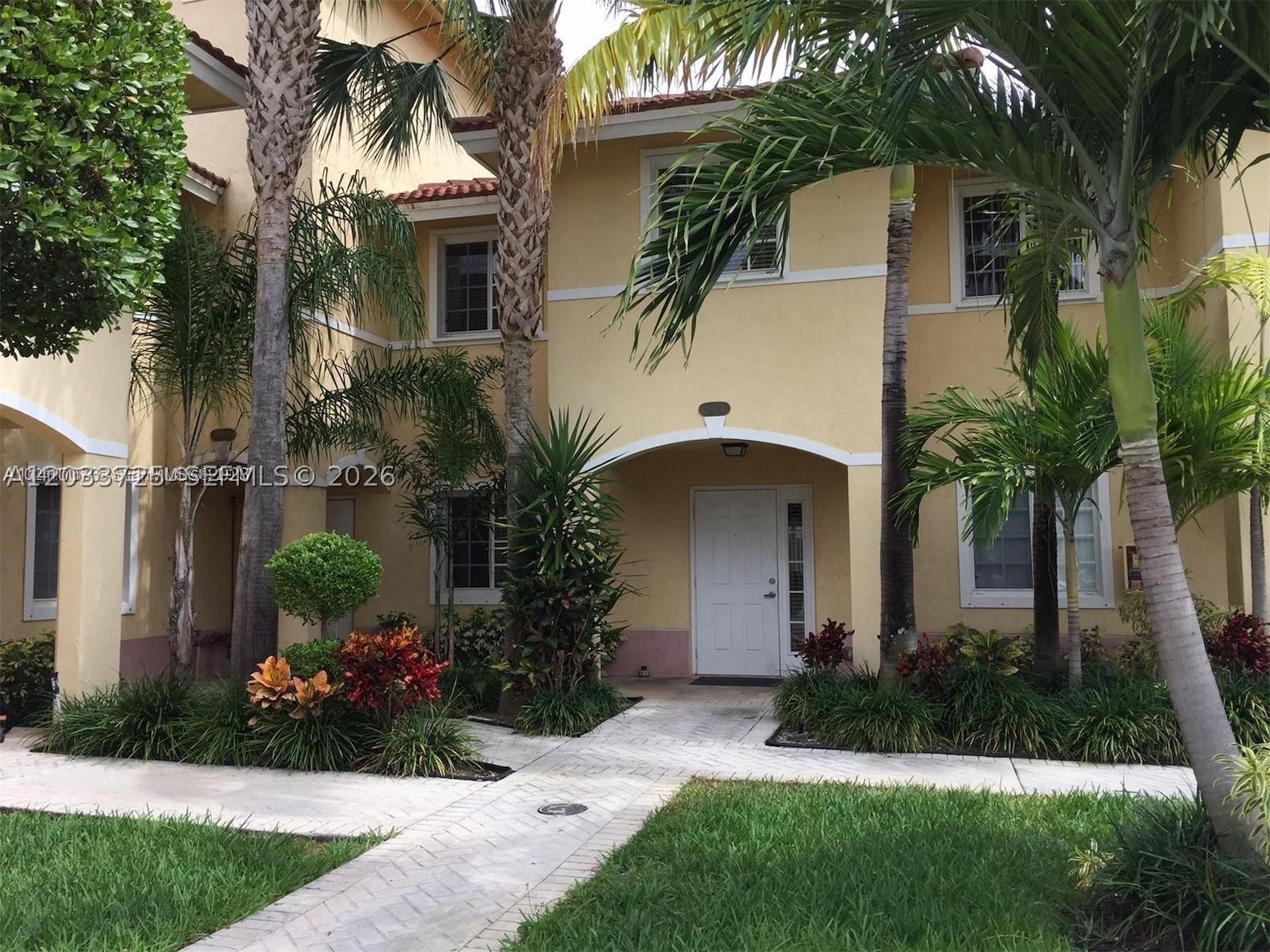 Gated Community with pool. Beautiful 3 bedrooms, 2.5 baths, tiles floors, open kitchen with outside patio. 3 bedrooms are in the second floor . 1 assigned parking right next to your door. Washer and dryer in the unit. Well maintained. Excellent location 6 minutes to the beach, Sunny Isles Beach and Aventura. Close to restaurants, supermarkets, bakeries and more!!! It won't last!
