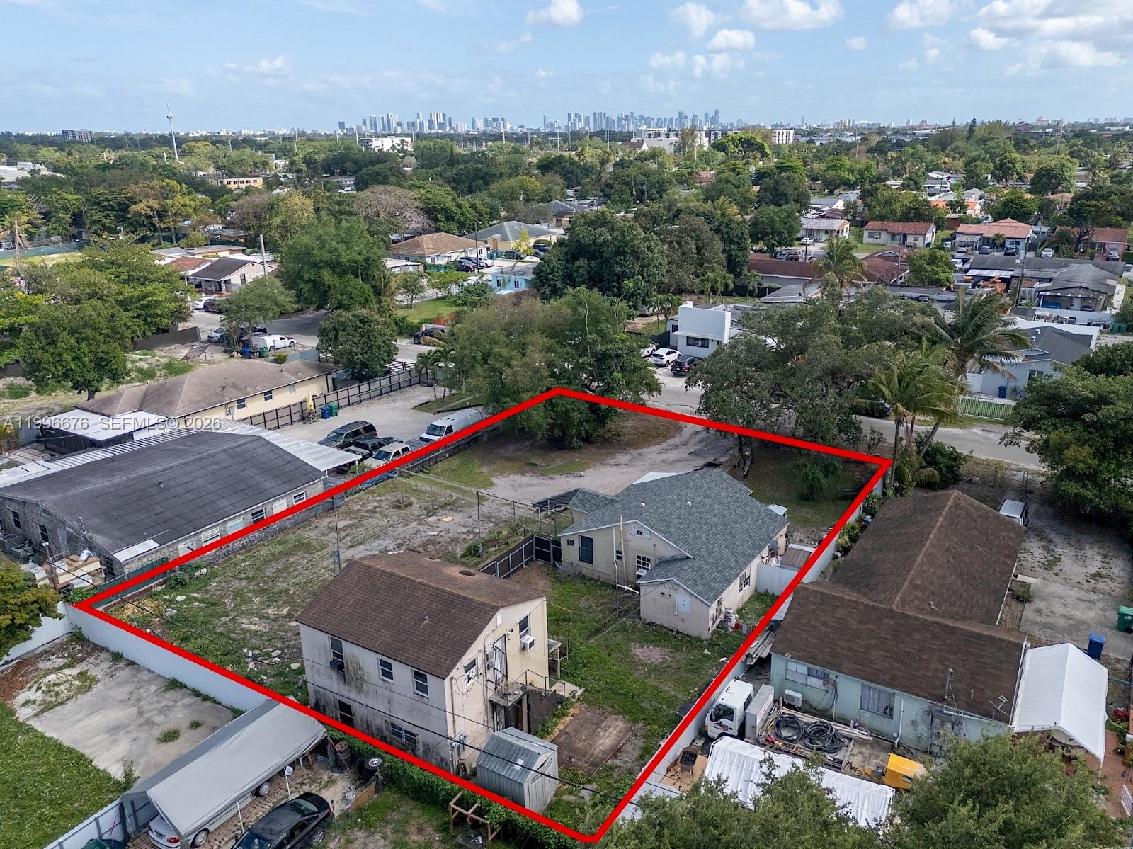 Your Miami investment journey starts here! This versatile triplex offers the perfect combination of unit variety and lot size — featuring a 3-bedroom/2-bath single-family home plus a two-story building with two additional 1-bedroom/1-bath units, all situated on a generous 14,000 SF lot, with CBS construction as per Miamidade.gov. Whether you're house-hacking, building a rental portfolio, or eyeing a future redevelopment, this property checks all the boxes. Conveniently located just minutes from Miami International Airport, major highways, Walmart, and premier shopping centers — the kind of central location that attracts tenants. With the right renovation, this value-add opportunity can become a strong cash-flowing asset in one of Miami's rental markets. As per Miami-Dade County, DOR Code 0803 designates the property as multifamily residential with 2–9 units, classified as multifamily with 3 or more units. Sold As-Is, priced to reflect condition. Photos have been digitally enhanced to best showcase the property's features. Sold strictly As-Is; seller will make no repairs. All offers must include proof of funds or a pre-approval letter. No showings without an offer. Do not disturb tenants.