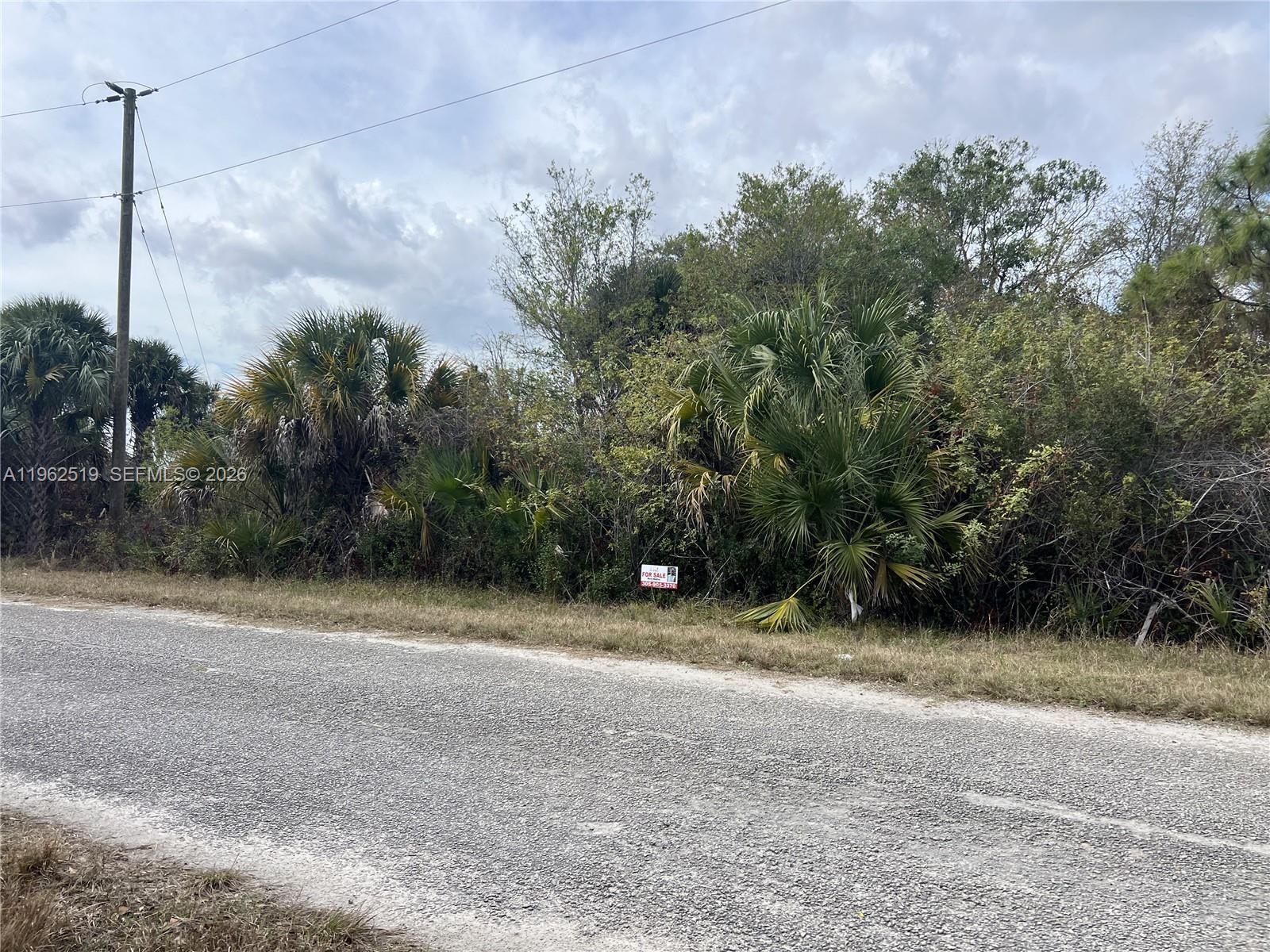 ATTENTION LAND BUYERS! Whether you are looking to invest or build your future home, this vacant residential lot with a canal offers a great opportunity. Located on a paved road in a quiet residential neighborhood, the property is conveniently situated near major roads, shopping, schools, and everyday amenities.