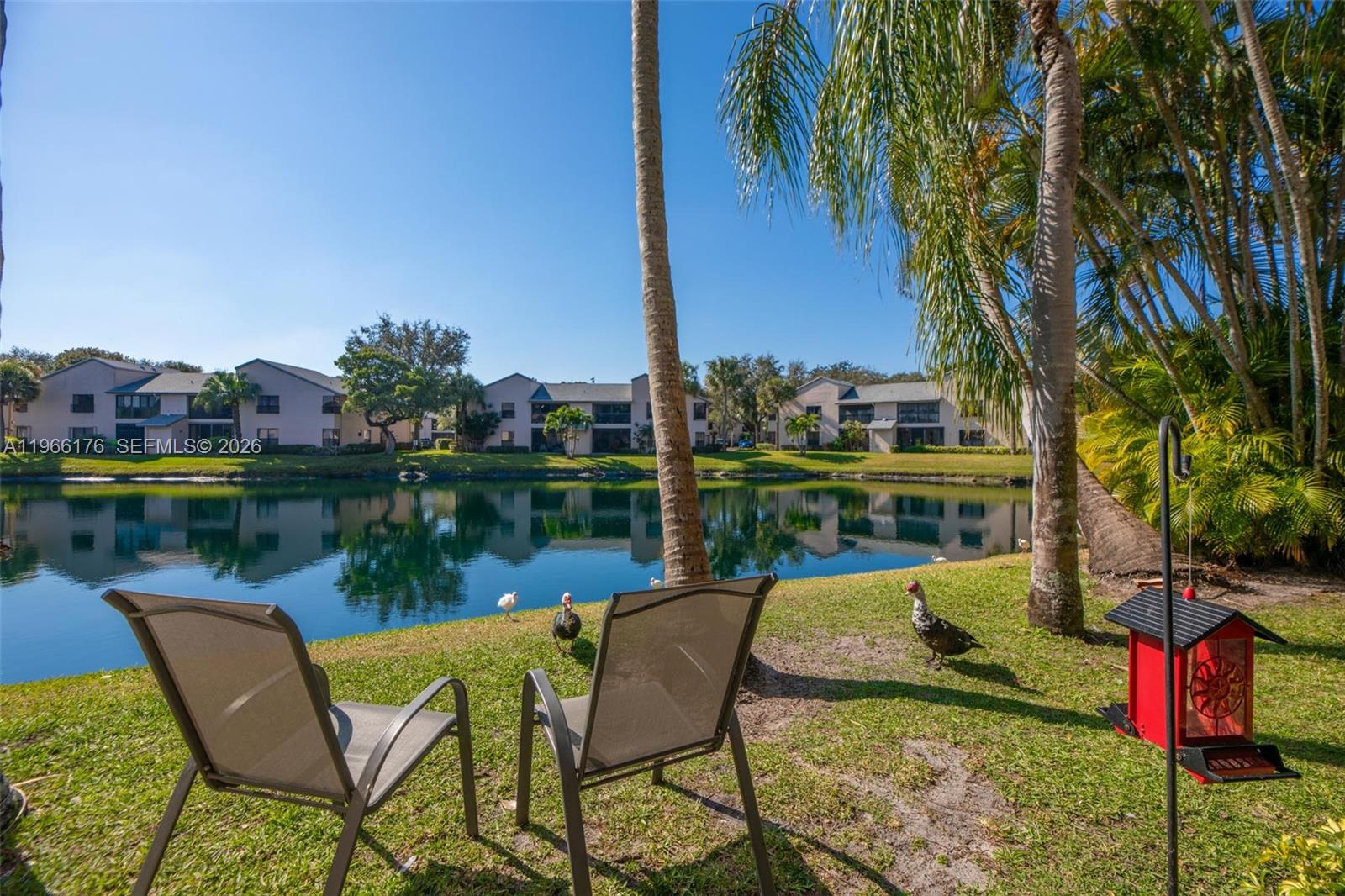 Experience serene lakefront living in this beautifully maintained 3-bedroom, 2-bathroom condo in the heart of Coconut Creek’s sought-after Karanda Village. Filled with natural light, the open-concept layout offers an expansive living and dining area with plenty of room to relax and entertain. Enjoy the convenience of in-unit laundry and unwind on your private screened-in balcony.

Residents of Karanda Village enjoy access to amazing amenities including an Olympic-sized pool, clubhouse, fitness center, sauna, basketball court, tennis court, theatre, barbecue/picnic area, and a child play area. Ideally located just minutes from the Promenade at Coconut Creek, schools, and major highways, this home delivers the best of the South Florida lifestyle.