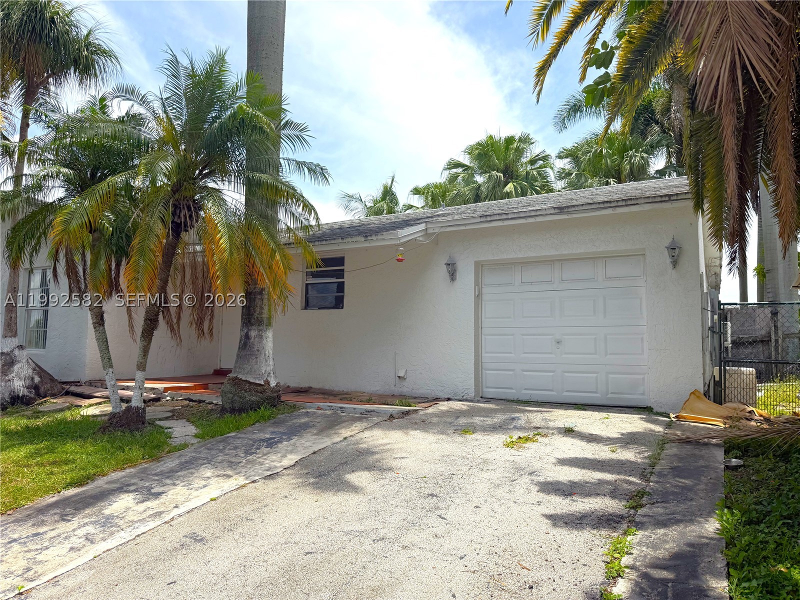 Welcome to your dream home! This charming single family home boasts 3 bedrooms, 2 bathrooms, and a 1 car garage, perfect for a growing family or those who love to entertain. The recently remodeled bathrooms add a touch of luxury, while the two side entrances provide convenience and privacy. Situated on a spacious 7,500 sq ft lot, there is plenty of room for outdoor activities and gardening. The abundance of natural light that floods the home creates a warm and inviting atmosphere, making it the perfect place to relax and unwind. With a brand new roof installed in 2020, you can rest easy knowing that your home is well-maintained and protected from the elements. Best of all, there is no HOA, giving you the freedom to personalize and enjoy your home without any restrictions.