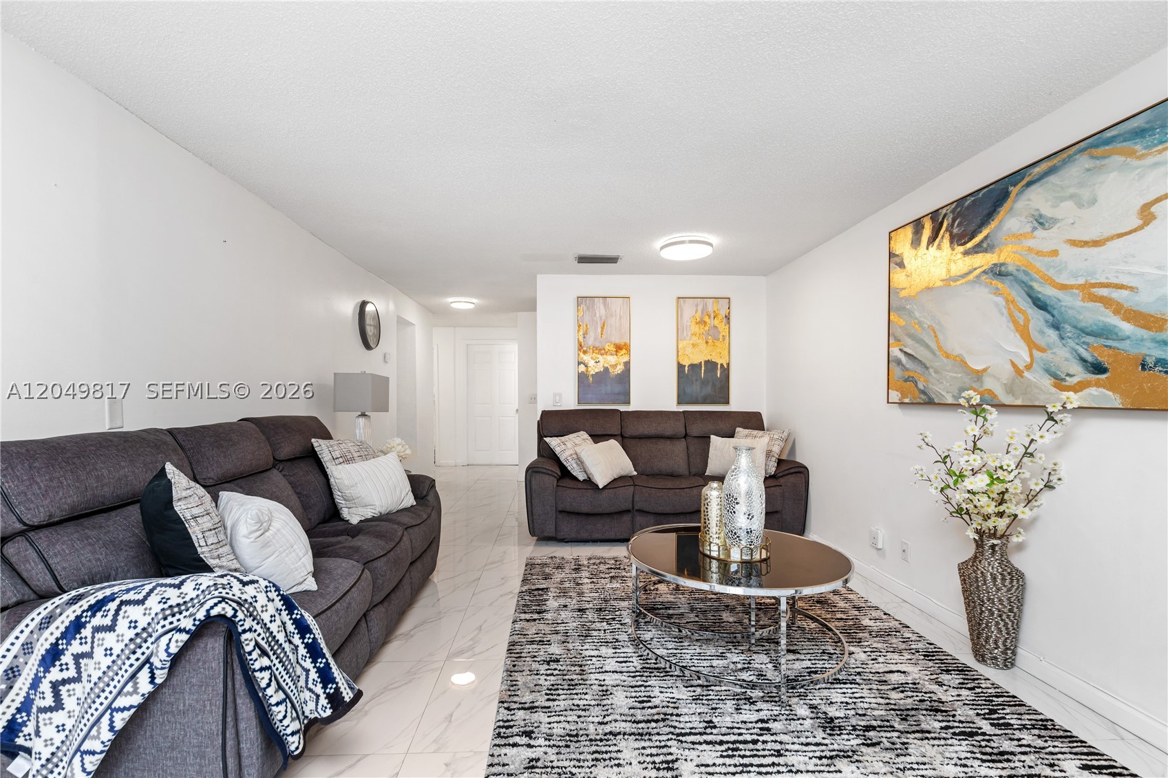 Welcome to this Pembroke Pines townhome, where comfort, space, and flexibility come together to create the perfect place to call home. Located in the desirable Westview community, this spacious two-story residence features 4 bedrooms, 3 full bathrooms, +flexible room  space, and a desirable first-floor bedroom with a full bath—ideal for guests, multigenerational living, or a home office. The thoughtfully designed floor plan offers generous living spaces for entertaining while providing private areas for relaxation. Enjoy porcelain tile flooring in the kitchen and dining area, quartz countertops, stainless steel appliances, modern flooring, updated bathrooms, and contemporary lighting throughout. Step onto your private balcony and take in peaceful lake views, the perfect setting to enjoy your morning coffee or unwind at sunset while surrounded by nature. The community offers outstanding value, with the monthly association fee including building insurance, water, cable, exterior maintenance, roof maintenance, reserves, and common area maintenance, providing a low-maintenance lifestyle and added peace of mind. Located near top-rated schools, shopping, dining, parks, entertainment, and major highways, this home combines comfort, convenience, and exceptional potential. Whether you're searching for your first home, upgrading to accommodate a  family, or looking for a residence that offers space, versatility, and a serene setting, this beautiful property is ready to welcome you.
