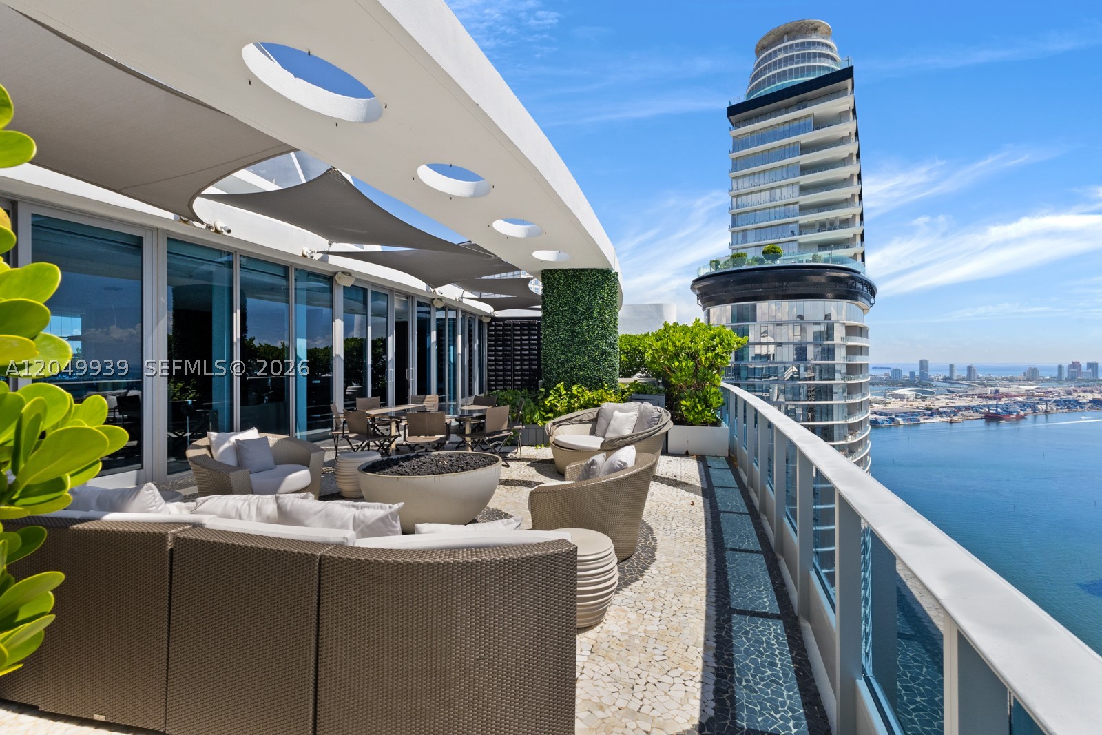 Experience elevated living in this professionally designed, ultra-luxury two-story penthouse at EPIC in Downtown Miami. Spanning over 6,000 SF of total space, this stunning residence offers 3 bedrooms, 5.5 bathrooms, and breathtaking bay, river, and skyline views. Fully furnished and curated with exquisite taste, it features rich wood and marble flooring, designer lighting, custom furnishings, and a sculptural spiral staircase as its centerpiece. Expansive terraces and 5-star building amenities — including valet, spa, fitness center, and rooftop pool — complete this extraordinary lifestyle offering. One of Miami’s most exceptional penthouses.