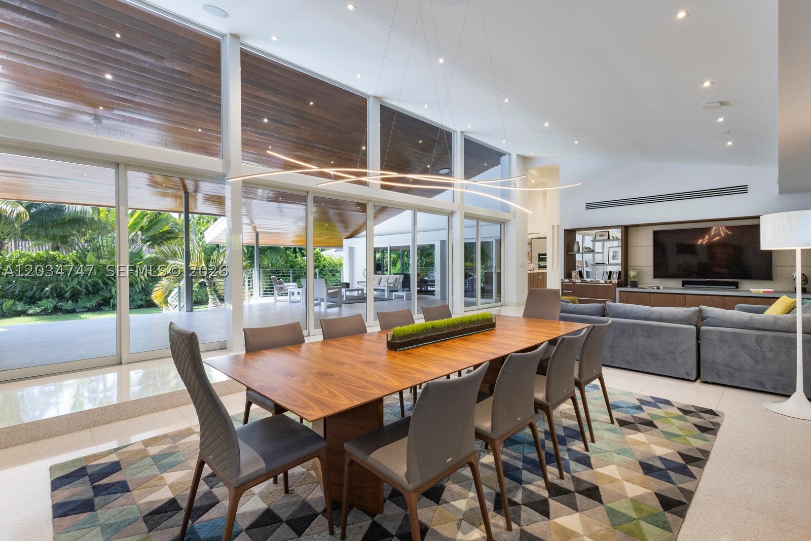 Gorgeous Pine Bay Estates North sophistication and style galore- fantastic Hollub-built family home with soaring high ceilings and windows, an incredible state-of-the-art kitchen (w/tons of storage!), and nice open layout. Modern finishes with full house renovation completed in 2017-2018 including roof, impact glass windows and doors, plumbing, electrical, and more!. Huge open-air patio overhang ideal for entertaining that leads to a spacious and private pool yard area. Lush landscaping, built-in breakfast nook, and gorgeous views from every room. Quiet street in coveted Coral Gables subdivision (with 33156 zip code and Pinecrest schools) and NOT in a flood​​‌​​​​‌​‌​​​‌‌​​​‌‌‌​​‌​​‌‌​​​​ zone.
