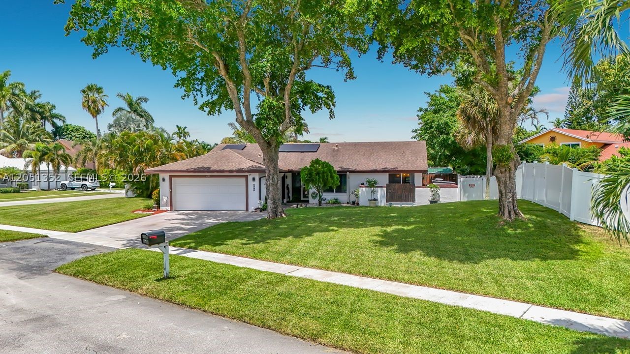 Welcome home to this beautifully maintained 3-bedroom, 2-bath residence that blends modern updates with comfort and peace of mind. 2-car air conditioned garage. Thoughtfully upgraded with a new roof (2021), impact windows, remodeled bathrooms, a whole-house 15KW generator, and leased solar panels ($206/month), this home is designed for effortless Florida living.

Inside, you'll find tile flooring throughout and bright, inviting living spaces that are perfect for both everyday living and entertaining. Step outside to your private backyard oasis featuring a screened patio, a sparkling chlorinated pool, and a fully fenced yard—ideal for relaxing, hosting family and friends, or letting pets play.

Conveniently located near shopping, dining, parks, schools, and major highways, this move-in-ready home offers the perfect combination of style, functionality, and outdoor living. Larger than tax roll as garage is ducted and air conditioned