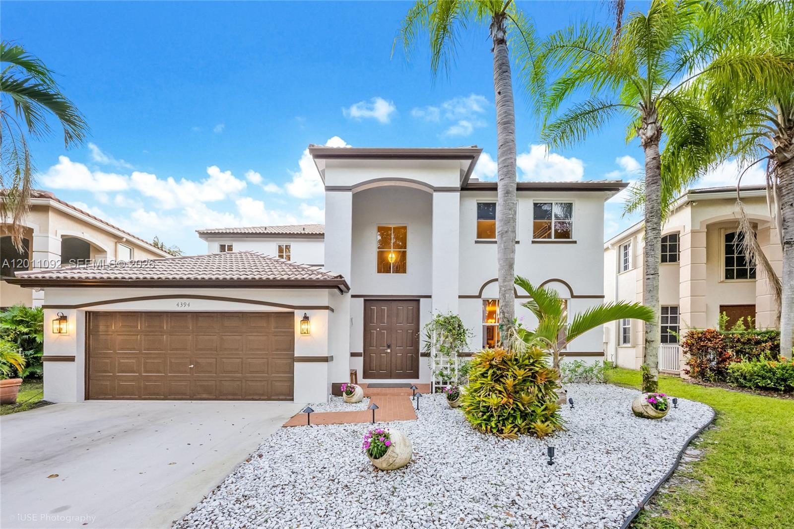 Are you searching for the rare combination that checks every box — gated community, 5 bedrooms, water frontage, a pool, and top-rated schools all in one? Welcome home to The Ridges in Weston.

This stunning two-story residence offers 5 bedrooms and 4 baths across a bright, open floor plan designed for how families actually live. The heart of the home flows seamlessly from generous gathering spaces to a large kitchen and out to your private backyard oasis — where a sparkling pool meets serene water views, a cozy gazebo, and zero rear neighbors. Whether it's a lazy Sunday swim or an evening with friends, this outdoor space delivers.

Inside, every detail invites you to settle in. Upstairs and down, the layout gives everyone room to breathe. And when the school bell rings, Weston's 100% A-rated schools are right around the corner, along with parks, dining, and everyday conveniences.

This is the one you've been waiting for.