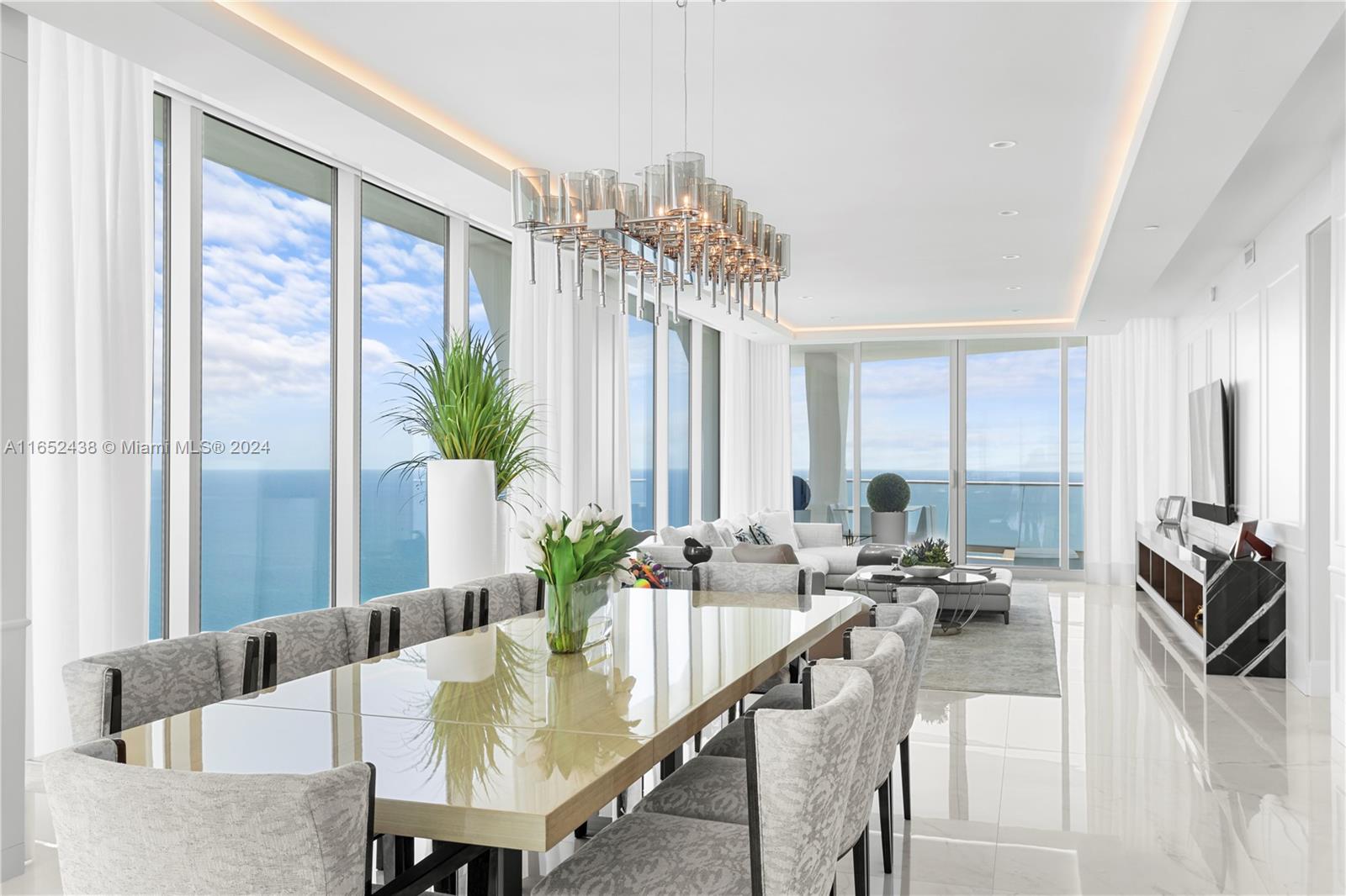 Spectacular Oceanfront at Jade Signature
Experience unparalleled luxury in this breathtaking 4-bedroom, 5.5-bathroom residence  Designed by renowned designer Steven G., this floor-through unit offers both direct ocean and city views. The elegant and timeless décor, with  luxury finishes.
The spacious layout includes a media room, service quarters, and expansive private balconies that enhance the living space. High ceilings, hidden doors, LED lighting in every room, and Snaidero kitchen with top-of-the-line appliances . This unit is offered fully furnished and turnkey.
world-class amenities, featuring a three-level health and wellness center, a luxurious spa, a children’s playroom, and many more state-of-the-art facilities designed to cater to every aspect of a refined lifestyle.