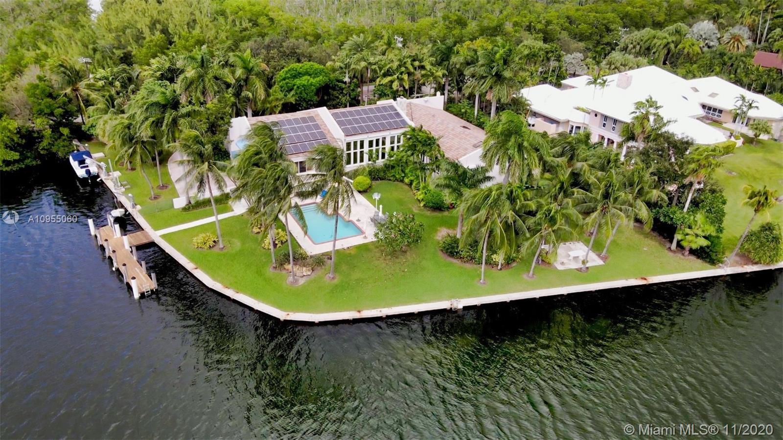 Ready to move in home located in one of Miami’s most desirable community, Gables Estates. Extended dock grandfathered in with no bridges to Bay. This house sits on a 58,000 sq. ft. corner lot with open water views.  Spacious 10,196 sq.ft. of living area, 5 bedrooms, 4.5 bathrooms, theater, wine room, full gym with sauna and steam, roof solar panels, and so much more.