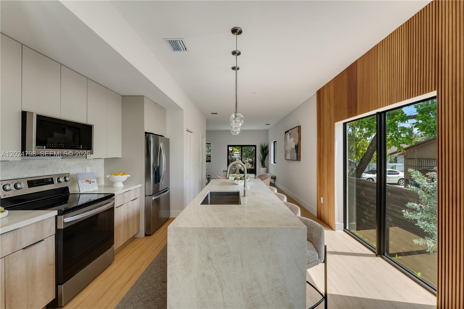Discover modern living in the heart of Allapattah—one of Miami’s most dynamic and rapidly evolving neighborhoods. This brand-new townhome places you at the center of it all, just moments from the renowned Rubell Museum, anchoring the area’s growing art and cultural scene. Positioned near Miami’s thriving Health District, you’re minutes from Jackson Memorial Hospital, University of Miami Health System, and the Miami Veterans Affairs Medical Center—a major driver of employment and long-term housing demand. Everyday convenience meets waterfront lifestyle at River Landing Shops & Residences, offering dining, retail, and fitness just minutes away. Modern design, unbeatable connectivity, and strong investment upside—this is your opportunity to own in the center of Allapattah’s transformation. Live modern. Invest smart. Be early.