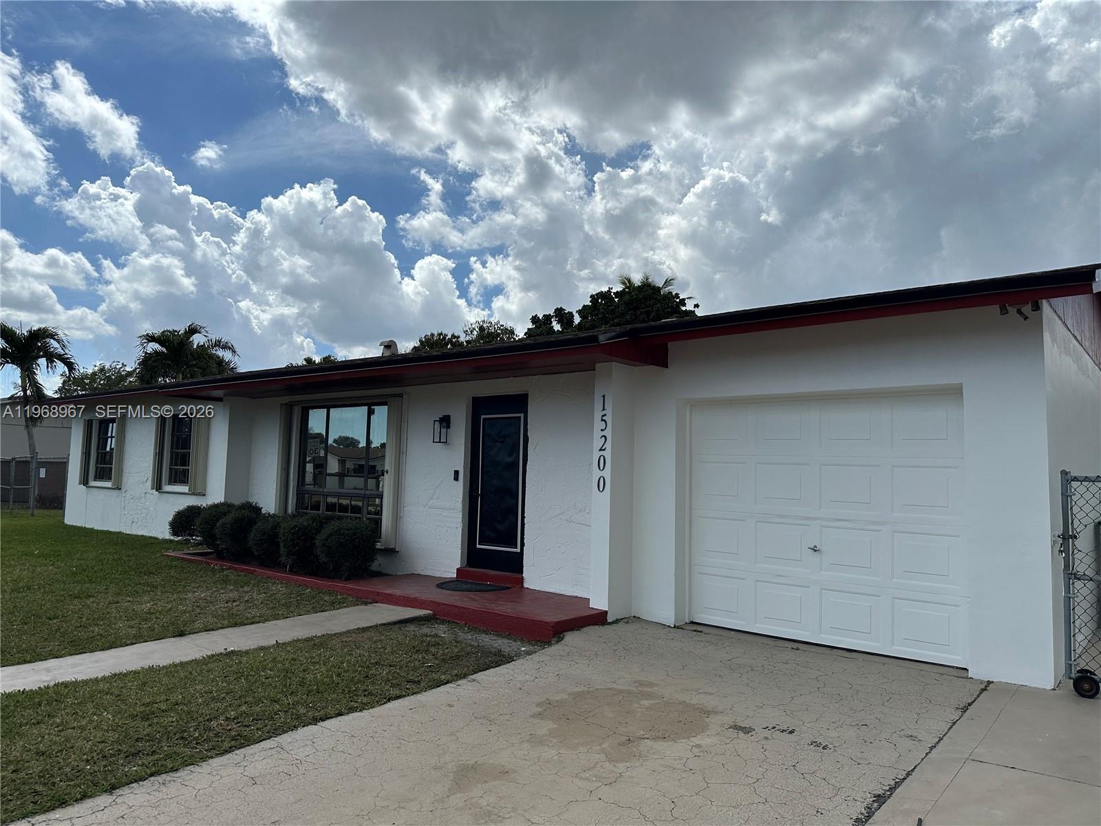 Welcome to an opportunity to enjoy the Florida lifestyle without the restrictions of a Home Owners Association. Say goodbye to long commutes; this property is centrally located and close to the Metro Zoo and the Florida Turnpike.  Newly renovated property with beautiful SPF laminate flooring throughout and porcelain floors and walls in the  bathrooms.  Beautiful bathrooms - new shower, tub, toilets, faucets, vanities and lit mirrors.  Totally renovated kitchen with all new stainless steel appliances and quartz counter-top. House is freshly painted inside and out with a creamy white or an expansive feeling. The land is oversized at nearly 12,000 square feet.  There is also a concrete shed for storage and a screened-in back porch for year-round entertaining.  Given the economy and the use of additional dwelling units, (ADU), this property could be expanded to accommodate your family or your investor instinct.  There is a driveway that is so long it can accommodate your boat and several cars.  All this property needs is YOU!