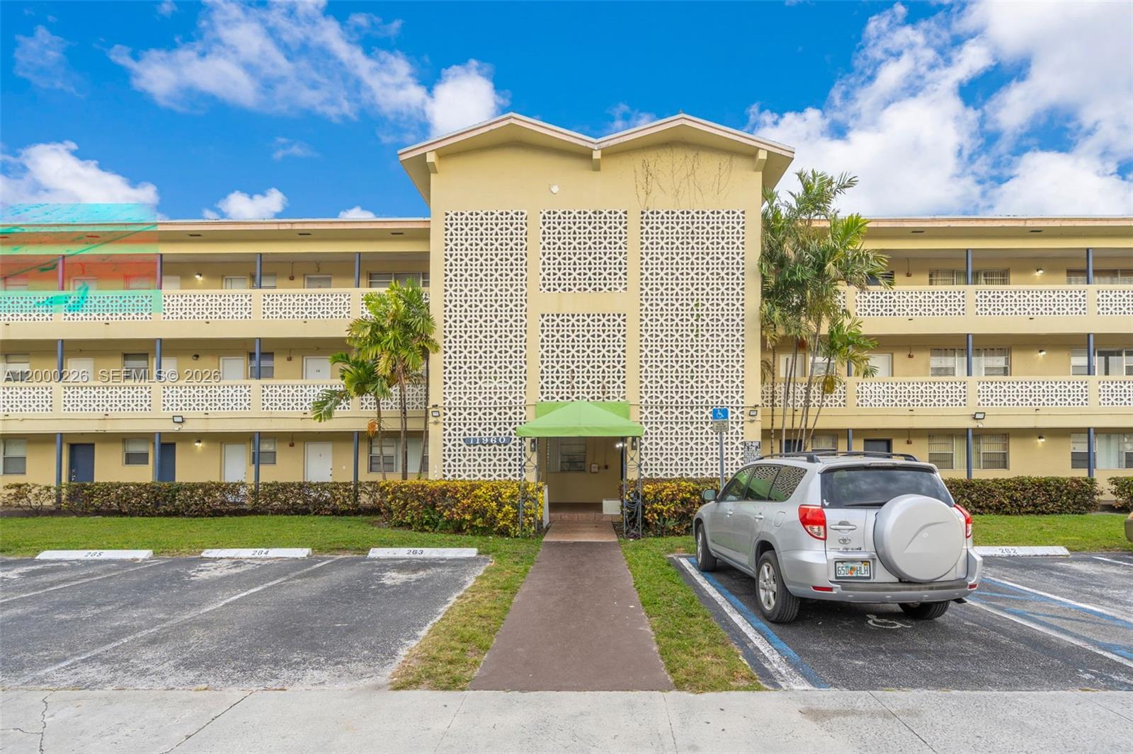 Spacious unit in San Souci, 1,224 SF of living space. Beautifully renovated, featuring 2 bedrooms, 2 baths. Porcelain floors all throughout the unit, custom kitchen with stainless steel appliances, updated baths, and custom closets. Prime location walkable distance to the gym, parks, stores, beaches, and restaurants. Easy to show. 2 parking spaces. Cash Only!