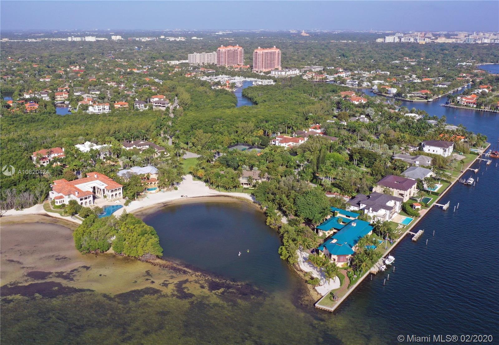 Sold with approved plans to remodel existing home. Current home was completely gutted down to the concrete structure. Ready for someone to create their dream home. This property is nestled in the private guard gated community of Tahiti Beach in Cocoplum. Comprised of only 28 homes, Tahiti Beach affords owners a private beach, lighted tennis courts and private, homeowner-owned roads.  Access is by appointment only.