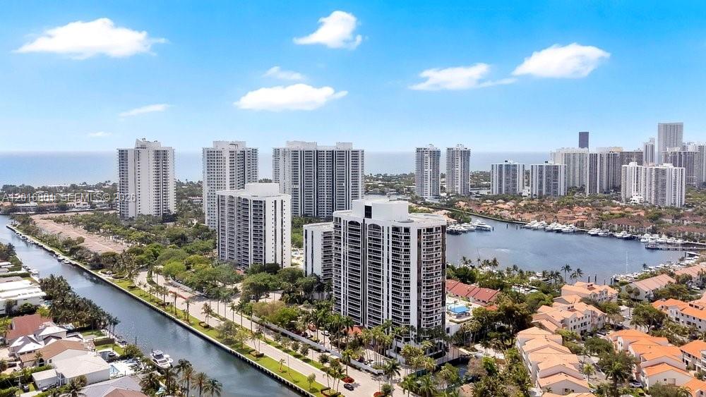 Stunningly updated 2-bed, 2-bath + den 1,590 Sq Ft residence with den at the Yacht Club Aventura, featuring spectacular waterway and canal, ocean, and skyline views. This spacious corner unit offers top-of-the-line finishes throughout, custom closets, a bright open layout, upgraded open Kitchen and bathrooms, and a versatile den ideal for a home office or guest room. The unit also includes 2 parking spaces. Enjoy resort-style amenities, including 2 pools, Jacuzzi, sauna, BBQ area, tennis and pickleball courts, fitness center, multi-purpose room, valet service, and 24-hour lobby concierge. Ideally located in the heart of Aventura, close to shopping, dining, parks, and beaches. Perfect for full-time living, seasonal use, or an investment opportunity.