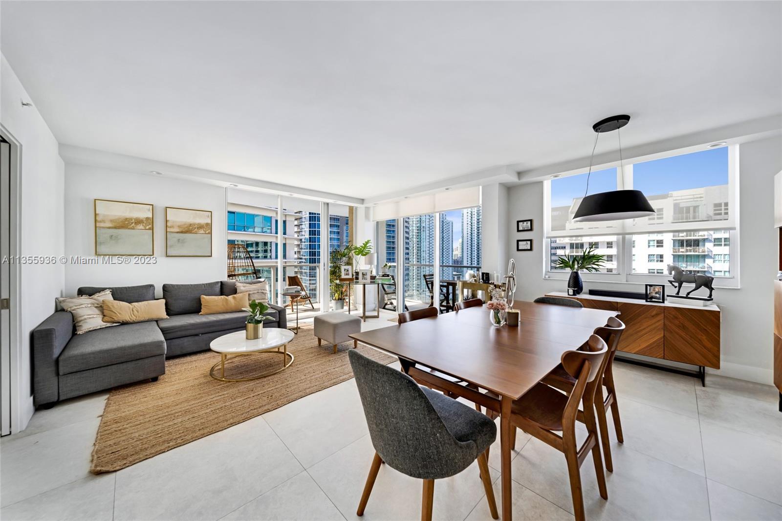 Fully renovated residence with amazing skyline and ocean views. This corner unit has an abundance of natural light and an intelligent new layout with a much more functional design. Owner renovations include new bathrooms, new open kitchen with custom quartz counters, wine fridge, new appliances, new AC, new washer/dryer, built in closets, an ample amount of storage and much more. The building offers 5 star amenities including large swimming pool, outdoor hot tub, tennis court, BBQ area, gym, 24-hour concierge, on-site restaurant, convenience store and so much more. Water, basic cable & internet included. One assigned parking space with option for more.