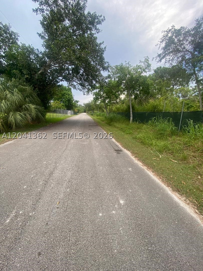 Rare opportunity to own approximately 1.82 acres in the rapidly growing areas of Homestead. this fenced property includes two separate parcel with individual folio numbers,  features a canal at the rear and offers excellent potential for residential and agricultural use. A portion of the property is designate as protected  land an may by subject to environmental restrictions; therefore, only a portion
of the site may buildable. Buyers are encouraged to conduct their own due diligence regarding zoning, permitted uses, buildable area, and environmental regulations.