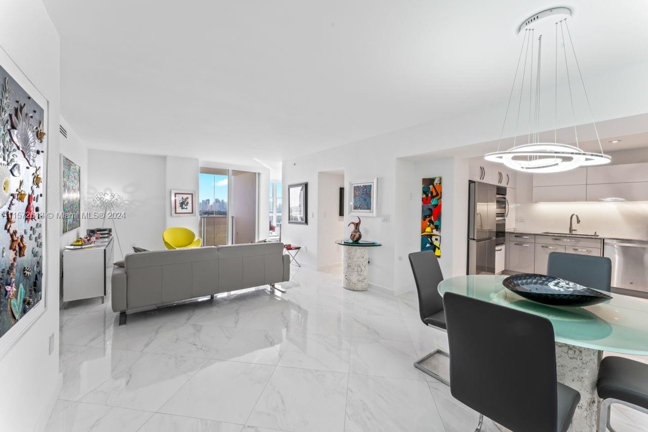 Beautifully renovated unit in 9 Island Ave in Belle Isle. Resort style living at its best. Remodeled w/huge walk-in primary closet, acrylic ducts, New AC 6/2024, oversized closets + laundry closet. Pristine porcelain floors throughout. The second bedroom opened up - used as an office. Overlooking Biscayne Bay: Monument, Venetian, Palm, Hibiscus and Star Island. Full service: 24-hour concierge, luxurious lobby, valet, fitness center, yoga room, children's playroom, party room, pool, Jacuzzis, tennis courts, boat docks and BBQ area. Belle Isle park: children playground, dog park and The Standard Hotel located in front of condo. Walkability scores high w/Venetian Causeway for exercise, Maurice Gibb Park, Sunset Harbour and Lincoln Road shops/restaurants. Move right in! See Attachments.