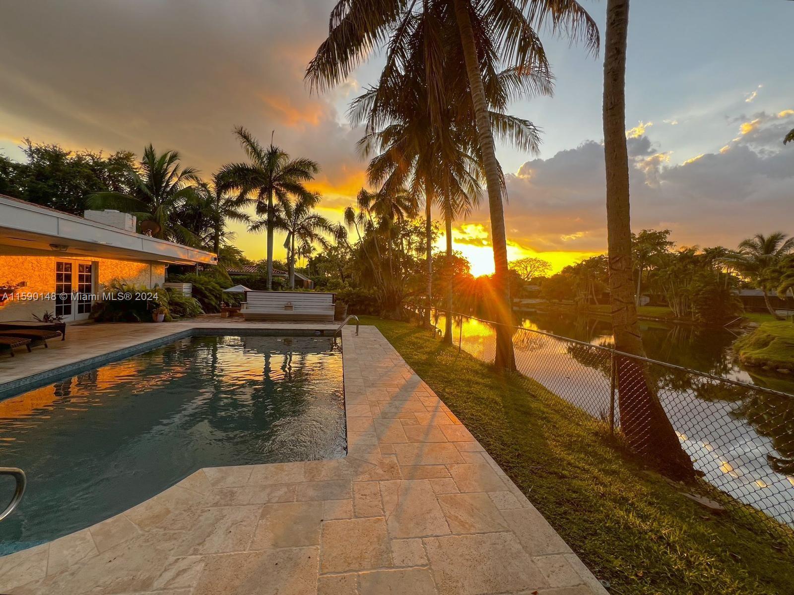 THIS IS A PREMIER SITE IN ALL PINECREST. BEAUTIFUL CANAL VIEWS. HUGE OPEN PATIO FOR ENTERTAINING THAT OVELOOKS AN OPEN POOL, WATERWAY, OAKS, AND PALMS. THIS SPACIOUS  FAMILY HOME IS LOCATED IN A CUL DE SAC FOR EXTRA PRIVACY.  HIGH IMPACT WINDOWS, FRENCH DOORS, SPANISH CERAMIC TILE FLOORS, NEW BARREL TILE ROOF IN 2007, GAS STOVE IN KITCHEN AND FIREPLACE IN FAMILY ROOM. NEW BATHROOM AND KITCHEN. SITUATED ON A HALF ACRE LOT,  THIS UNIQUE HOME FEATURES 4BED/3BATH ON A 2,615 SQFT. FLOOR PLAN.  FIFTH BEDROOM IS IN LAW/MAIDS ROOM. PERFECT FAMILY HOUSE. CIRCULAR DRIEVEWAY AND TWO CAR GARAGE. PINECREST IS VERY WELL KNOWN FOR TOP RANKING PRIVATE AND PUBLIC SCHOOLS IN THE AREA.  CLOSE TO ALL SHOPINGS, SCHOOLS AND PARKS.  AVAILABLE JUNE 1ST, 2024.