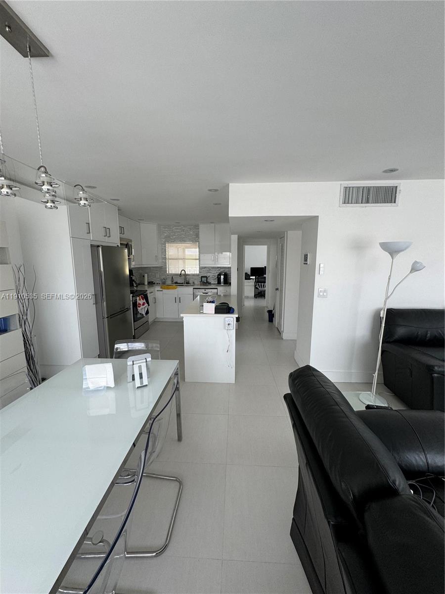 SALE: $195,000. reg. $245,000. MAKE YOUR OFFER NOW!!! 1 bedroom, 1 bathroom, CORNER UNIT. RENOVATED WITH PERMITS(save 1 year delay!) CORNER UNIT: FULLY ILLUMINATED with large windows! screened florida room outside.  
Modern ceramic tile; Inside and outside, even on the walls of the bathroom! QUARTZ COUNTERTOPS.
Modern bathroom shower column, with massage. Touchless kitchen faucet. Modern kitchen with soft closure. comfortable bedroom with ample closet space. designated parking spot. 12 MINUTES AWAY FROM FORT LAUDERDALE AIRPORT!!,  2 minutes away from the NOW OPEN Hollywood beach golf course! 
8 MINUTES FROM THE BEACH(2.8 MILES) !!!  alarm..com domotics and alarm is paid. 
NO rental before 18 months of occupancy. refrigerator and dishwasher excluded. Land is owned. fee $200. per applicant