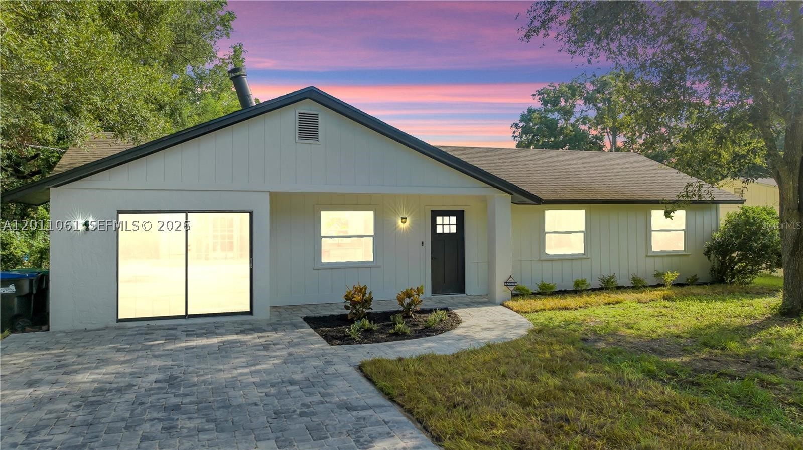 Be the first to check out the newly resurfaced pool and this great opportunity to own a renovated home with a refreshed outdoor feature. This property offers flexibility as a primary residence, a second home, or an investment opportunity, with the ability to rent daily with no rental restrictions. Stylish, remodeled 3 bed, 1.5 bath home in Orlando’s Little Lake Park. Bright interior with new double-pane windows and sliding doors. Living room features a stone corner wood-burning fireplace. Updated kitchen with new cabinets, quartz countertops, backsplash, and stainless steel appliances. Includes a spacious 21-ft living room (converted garage), perfect for office, gym, or additional living space ideal for house hacking. Bathrooms updated with modern fixtures and rain shower. Interior laundry and powder room. Fiber optic cable installed for high-speed internet. Fully fenced backyard with screened patio overlooking a uniquely shaped pool—ideal for relaxing or entertaining. Centrally located near State Road 50, Interstate 4, College Park, Downtown Orlando, shopping, dining, and Costco Wholesale.