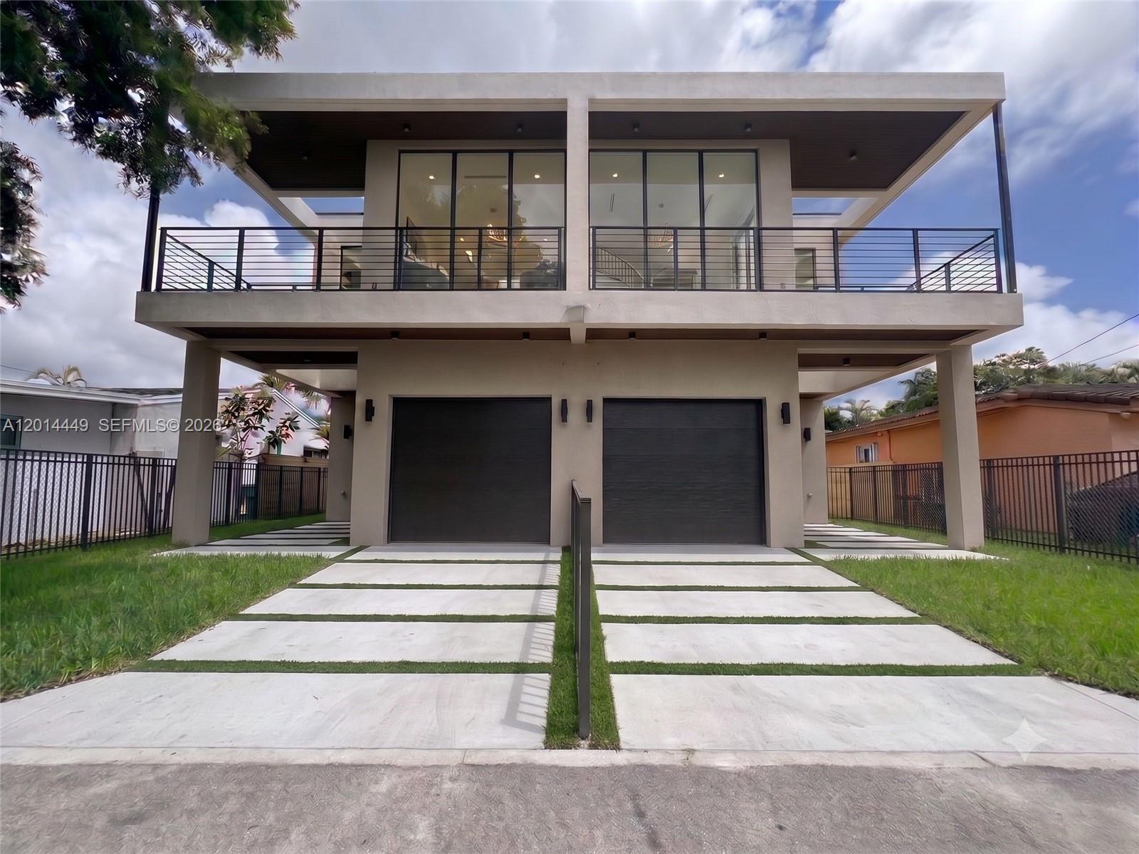 New Construction, feels like a single family home! Located in the highly sought-after Shenandoah neighborhood, this beautifully designed townhome blends timeless architecture with modern luxury. The thoughtfully crafted layout offers bright, open living spaces that create the comfort and feel of a single-family home. Situated on an approximately 4,000 sq. ft. lot, this property offers significantly more outdoor space than most townhomes in Coconut Grove, Coral Gables, or Shenandoah. With 2,571 sq. ft. of living area under air, the residence also provides a more spacious interior compared to many townhomes in the surrounding area. The outdoor area is designed for both relaxation and entertaining, featuring a large heated and chilled pool and a generously sized backyard with lush landscaping, including beautiful Florida native trees that create a private and tranquil setting. Outdoor shower for your convenience. EV charger ready. Expected completion date May, 2026.