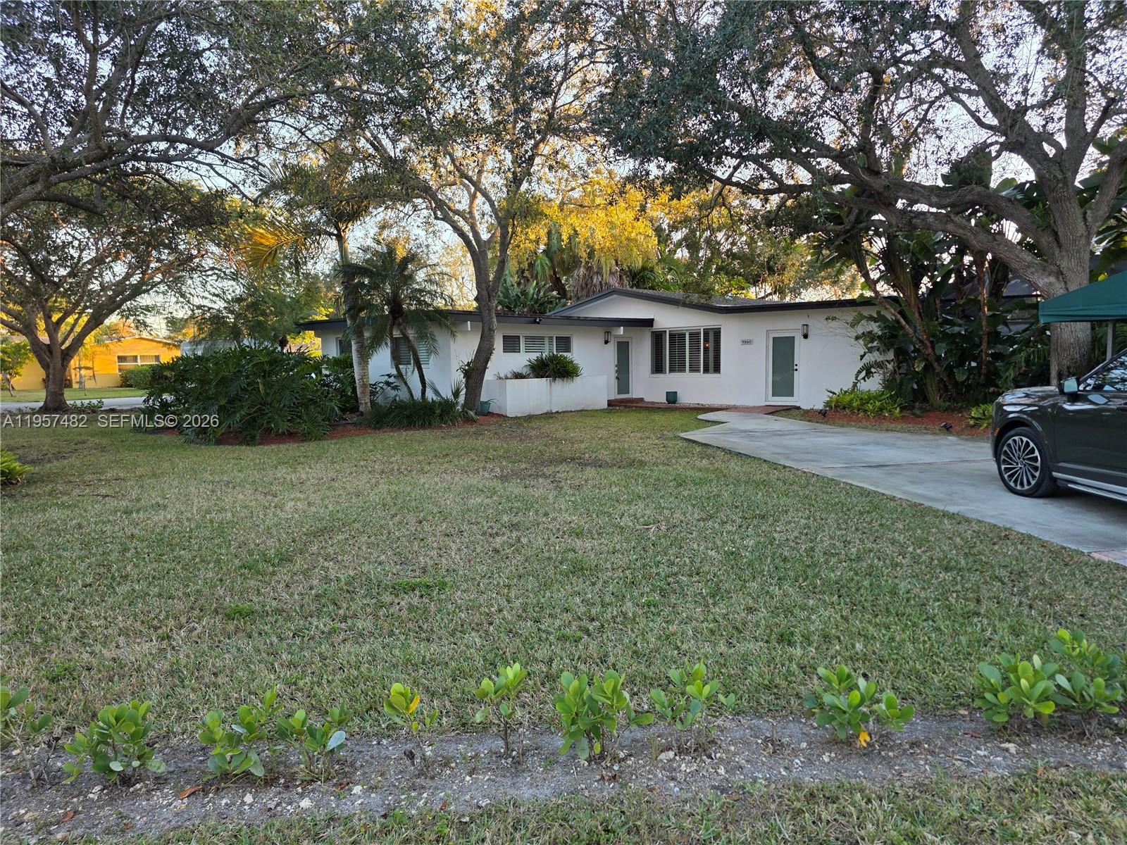 Prime Location! Escape to your own private sanctuary on an expansive, lushly landscaped 20,000 sft corner lot. This captivating home features a 4 bedroom 3 bath, plus den or Office and pool. Host unforgettable evenings in the screened-in pool and patio area, framed by panoramic sunset views and mature oaks. Property has 3 different driveways, with ample room for a large boat or RV. No flood insurance required. Enjoy the proximity to elite schools and walking distance to The Falls Mall. This is a rare opportunity to own a tropical retreat in Miami's most coveted community. This home can be also use as 3/2 Home with Den, and a 1/1 in laws quarter. Includes Impact windows, plantation shutters, 2 large sheds, and many more features. Motivated seller. Bring your offer today!