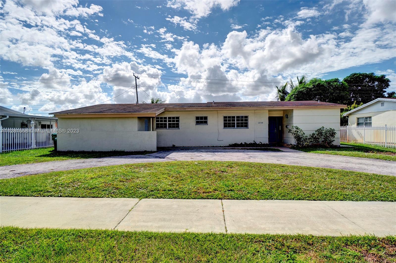 Clean 3 bedroom 2bath single family residence with a large pool & fenced yard.  Home is minutes from the Hard Rock stadium, major expressways, and tons of shops and stores in the new Gardens Promenade. Perfect as your first home or as an investment property.