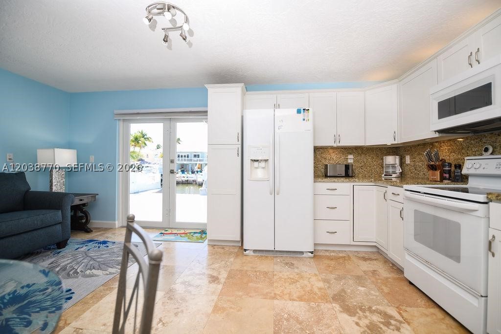 KEY LARGO OCEAN SHORES AD - Residential Lease