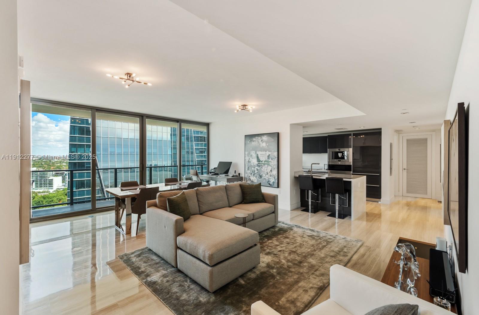 Experience the epitome of urban luxury in this exquisite 2-bedroom, 2-bath unit, ideally located in the prestigious Echo Brickell—one of the most sought-after high-rise buildings in the heart of Brickell. This sophisticated residence boasts elegant marble flooring, sleek Italian glass cabinetry, and breathtaking marble countertops. The gourmet chef's kitchen is a culinary masterpiece, complemented by a cutting-edge smart home system and a convenient summer kitchen, perfect for entertaining. Indulge in unparalleled amenities, including a 33rd-floor infinity-edge pool with a spa deck offering panoramic views of Biscayne Bay, a state-of-the-art fitness center, and 24/7 concierge service. This is the ultimate rental opportunity for those seeking a blend of luxury, convenience, and style.