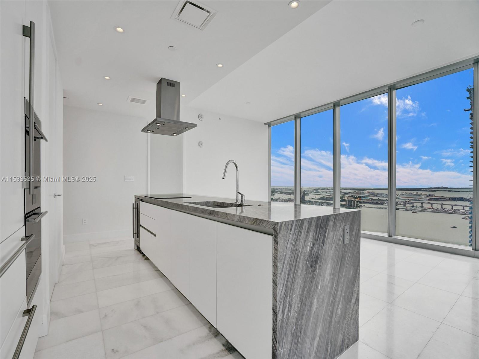 Introducing Missoni Baia, Miami’s new icon of waterfront luxury. Located in the prestigious Edgewater district, Residence 3505 is a premier corner unit featuring panoramic south views of Biscayne Bay and the Port of Miami, plus breathtaking west-facing sunsets. This brand-new residence offers elegant marble floors, a custom Italkraft kitchen with Sub-Zero appliances and refined designer finishes throughout. Residents enjoy three full floors of world-class amenities, including an Olympic-size lap pool, spa, fitness center, and more. Line 05 residences are uniquely protected from future construction next door, ensuring permanent, unobstructed views.