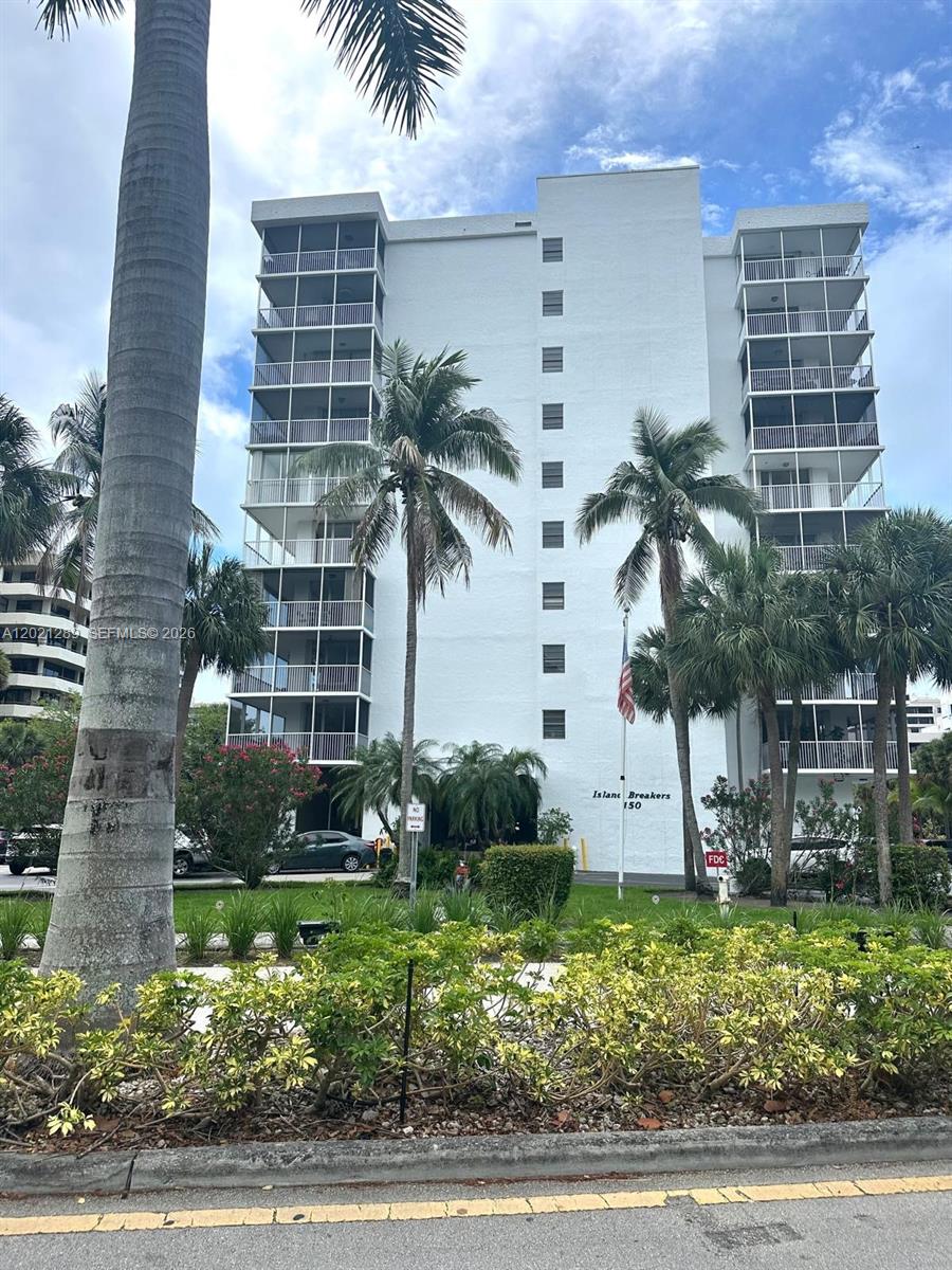 Live in paradise just 5 minute walk to the beach and the charming village of Key Biscayne. Close to Crandon Park.  Large, bright corner in a boutique condo building featuring 2 bedrooms 2 bathrooms.  Fully renovated, updated bathrooms, marble floors.  The contemporary kitchen offers built-in appliances, a wine fridge and reverse osmosis drinking water.  The dining area may be enclosed and converted into a den or third room.