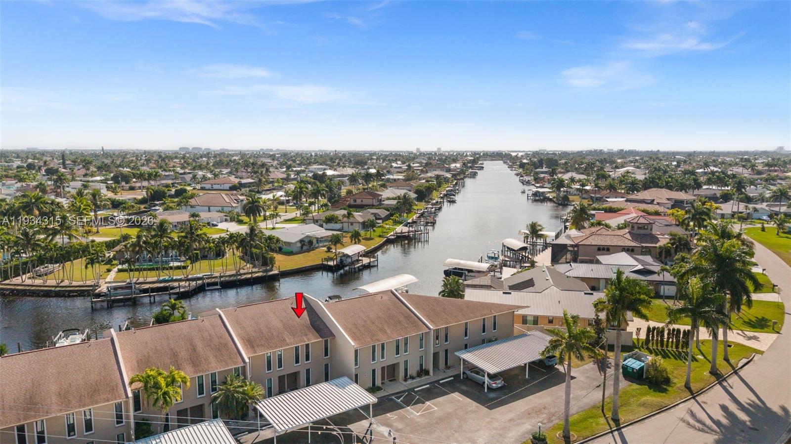 This well-maintained DIRECT GULF ACCESS waterfront condo is located in the small community of Parkway Place. This two-story residence offers 2 bedrooms, 2.5 bathrooms, and 1,015 square feet of comfortable living space with incredible water views and NO BRIDGES to the Gulf. Enjoy your own private boat slip and dock on the San Carlos Canal, with quick access to the Caloosahatchee River and open Gulf waters, or spend the day fishing right from the dock.
The main living level features an open-concept kitchen and living area, ideal for everyday living and entertaining. The kitchen includes stainless steel appliances, crown molding, an island with breakfast bar seating, and a door leading to the screened porch. The porch overlooks the wide canal, offering peaceful water views and refreshing breezes. A convenient half bath is also located on the main floor.
Upstairs, the primary bedroom features a private screened balcony with stunning canal views and an en-suite bath. A second guest bedroom and full bathroom complete the upper level. The stairway is equipped with a CUSTOM ELECTRIC CHAIR LIFT for added accessibility. Also impact windows and a carport.
Parkway Place is a quiet waterfront community offering a shared dock with tiki hut and a community pool. PET FRIENDLY with approval. Centrally located near downtown Cape Coral, Tarpon Point, Fort Myers, the airport, and local beaches, this is a great opportunity to enjoy true Gulf access boating in a low-maintenance condo setting.