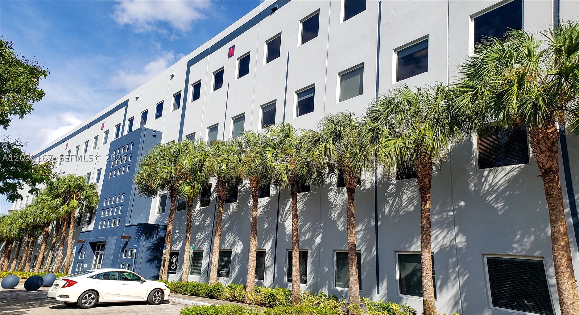• Contemporary architecture
• Cafe on ground floor
• Two-story lobby 
• Two (2) elevators and three (3) staircases
• Two (2) common conference rooms
• Common greeting area (2nd floor mezzanine)
• Generous parking (covered, exterior plus 52 short-term guest parking)