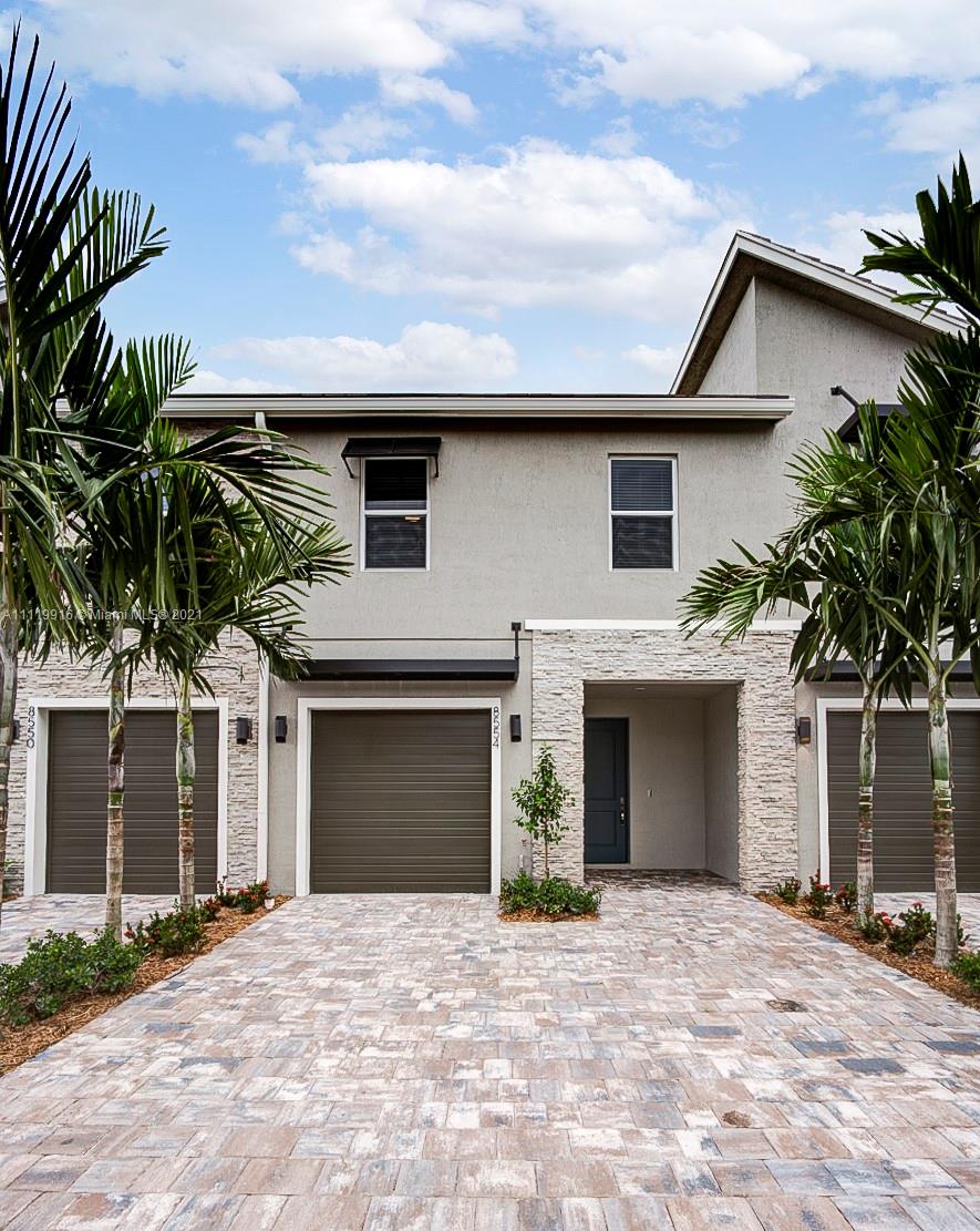 Best Location! Brand new construction and maintenance free! Be the first lucky resident to live in this 3 bedroom, 2.5 bath “Smart Home”. Spacious and bright downstairs area, amazing kitchen with white cabinetry, ceramic tile, stainless steel appliances, granite countertop, walk in pantry & updated backsplash, half bathroom, updated light fixtures, blinds and cealing fans through. One car garage and large driveway. Carpeted stairs and 3 spacious bedrooms, and closets, shared full bathroom with a tub, and a full size laundry room, lots of closet space. An inviting master bedroom and bath, walk in closet + linens. Publix, BofA and Dunkin Donuts within walking distance. Nearby is FL Turnpike, The Palm Beach Zoo, JFK Medical Center, Palm Beach Children’s Hospital and Wellington Regional.