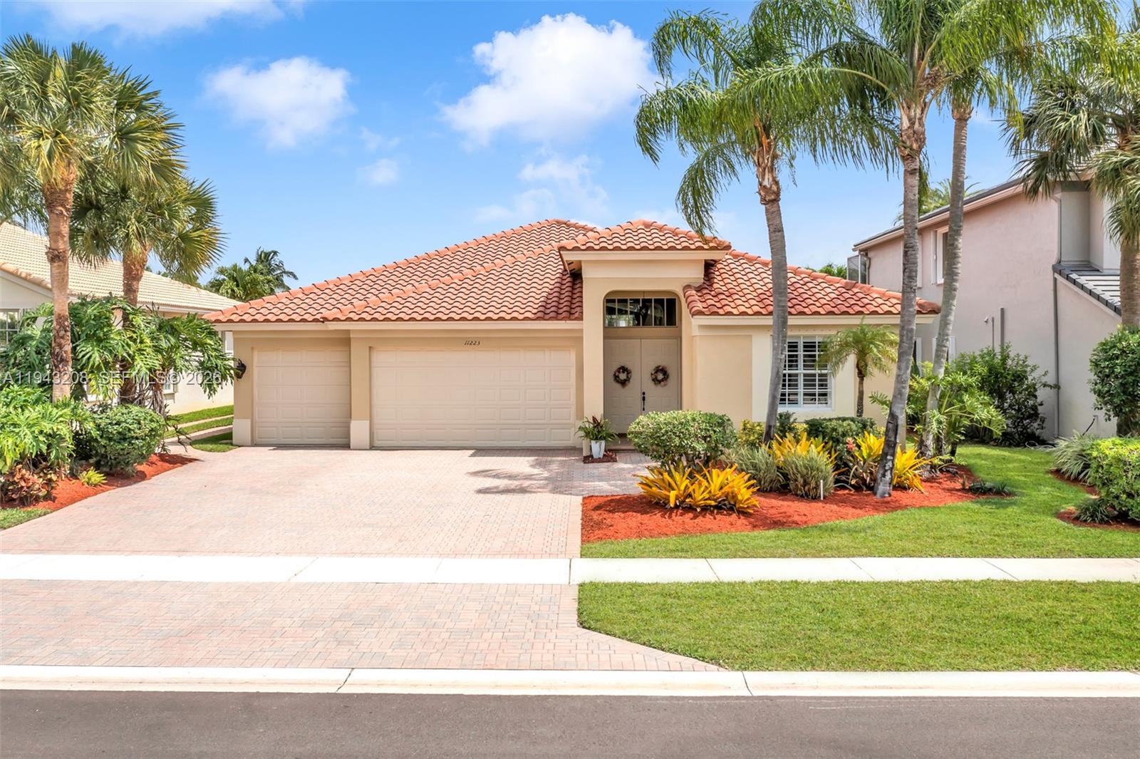 Experience this stunning, 4/3 lakefront home in the stunning, guard gated, safe haven community, The Isles at
Wellington. Nestled in the heart of the World Renowned, World Class Equestrian in Wellington. You'll say WOW the moment you open the door! Long, wide open hallway and extremely high 14ft ceilings, open floor plan,
overlooking the tropical landscape, completely remodeled pool, jacuzzi & lake front view. Recent upgrades include newer AC unit, pool and jacuzzi heater. Roofs about 10 yrs, in great shape and no damage or repairs. Pool Features include a state of the art, completely renovated pool deck, pool plaster, self cleaning pool,remote control/ automated system, mosaic design. Desired school district,Worldclass amenities and close to plenty of shopping.