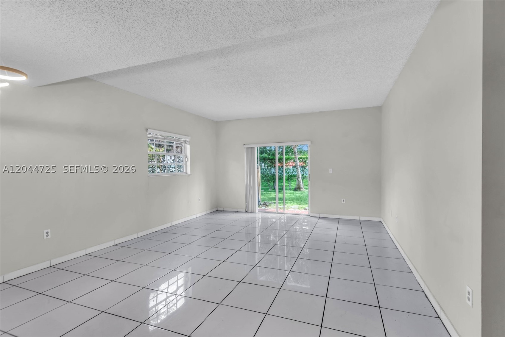 BLOSSOMS AT THE HAMMOCKS - Residential