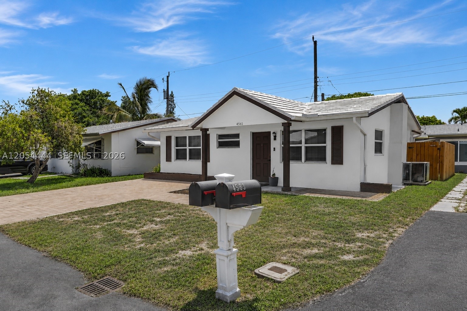Welcome to 4561 NW 16th Terrace, a beautifully updated 2-bedroom, 2-bathroom home in the heart of Tamarac. This move-in-ready home features luxury vinyl plank flooring throughout, fresh interior paint, a remodeled kitchen with shaker cabinets, quartz countertops, new stainless steel appliances, a new smart washer and dryer, a newly installed EV charging outlet, and a newly fenced backyard for added privacy. Additional highlights include a concrete tile roof, paver driveway for added curb appeal, low HOA dues of just $80 per month with access to the community clubhouse and pool, this home is not located in a flood zone for added peace of mind. Offering modern updates, low-maintenance living, and exceptional value, this home is ready for its next owner.