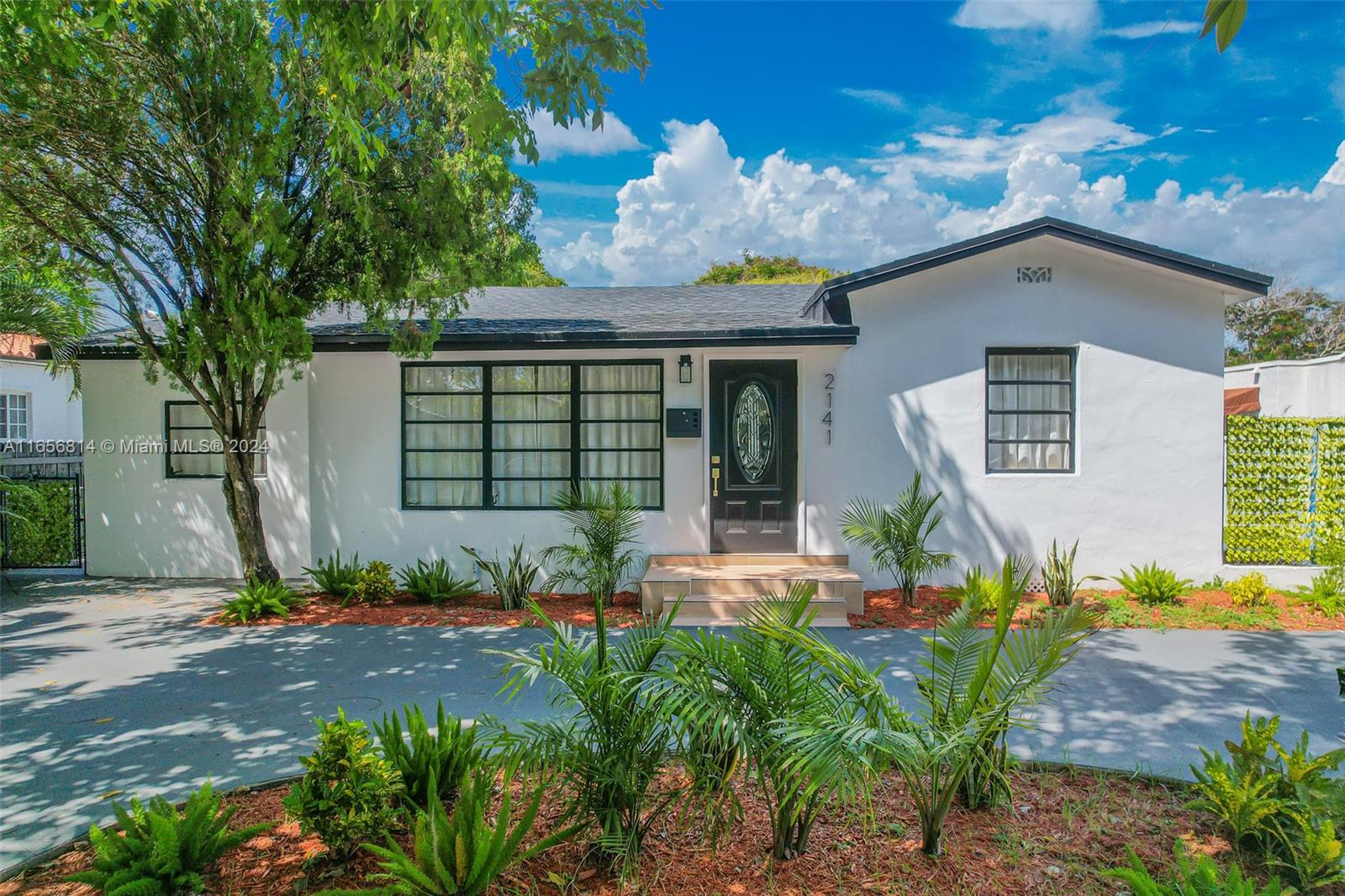 Welcome to Villa Shenandoah! This recently remodeled home features 3 bedrooms, 3 baths, plus an office or den that can be converted into a 4th bedroom. Enjoy a brand-new roof, new flooring, and a state-of-the-art open kitchen with custom cabinets, wood countertops, and stainless steel appliances. The spacious living area includes an Art Deco fireplace, and the home boasts new plumbing throughout. Two bedrooms have ensuite bathrooms and separate entrances. Located near Brickell, Coral Gables, Coconut Grove, and the beaches, this home is ideal for short-term rentals. The private fenced backyard offers space for a pool or hot tub, perfect for creating your own oasis. Vacant and easy to show. Contact the listing agent for more information or a private showing!