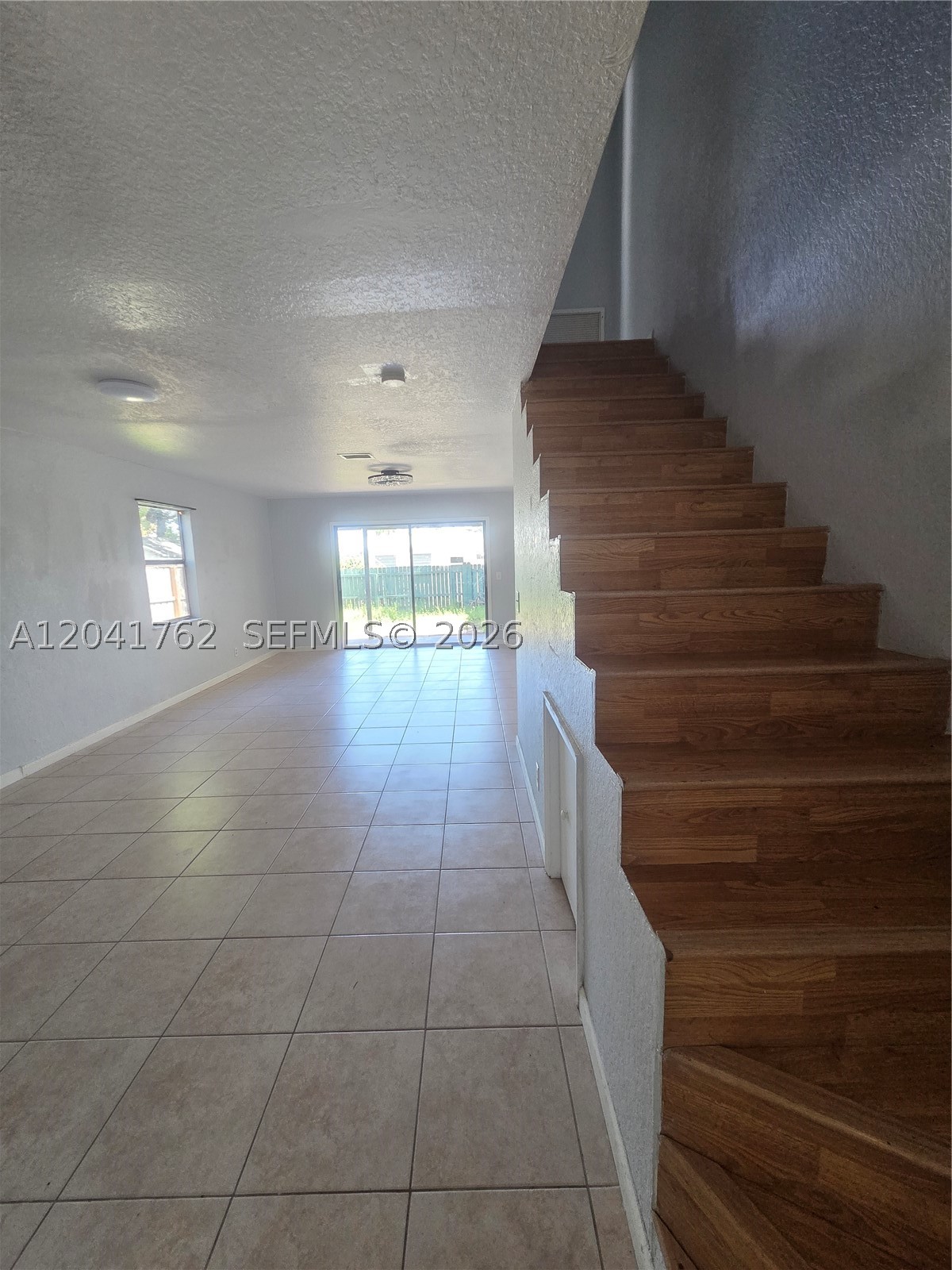 Welcome home to this spacious and bright two-story townhome featuring 2 bedrooms and 2 bathrooms, plus a large private patio and fully fenced yard—perfect for relaxing, entertaining, or enjoying outdoor living. This well-maintained residence offers an open and comfortable layout with stainless steel appliances, in-unit washer and dryer, and plenty of living space throughout.
Located in a quiet, well-kept community with assigned parking and a sparkling community pool, you'll enjoy both comfort and convenience. Just minutes from shopping, dining, I-95, US-1, the beach, Brightline and Tri-Rail stations, and major commuter routes. A fantastic opportunity to enjoy South Florida living in a centrally located neighborhood.