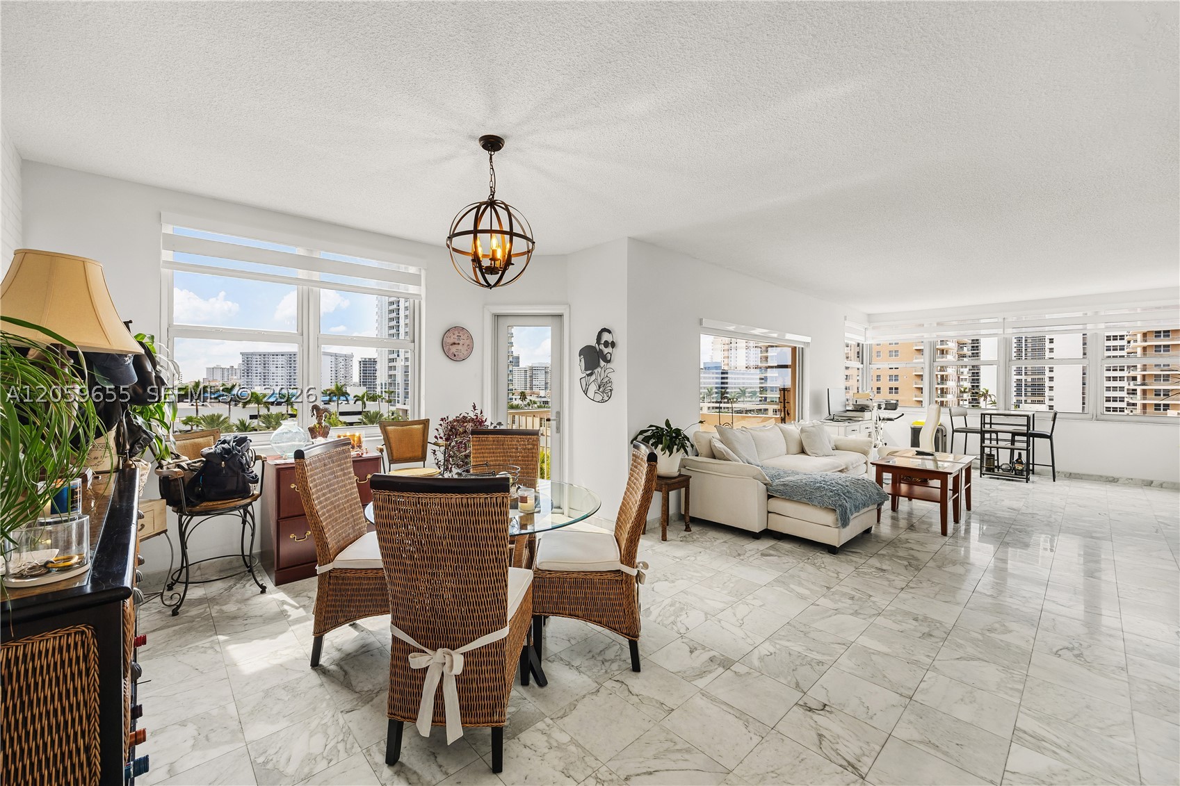 Welcome to oceanfront living at its finest in this beautifully updated 2-bedroom, 2-bath corner residence in the sought-after Hemispheres. Offering 1,340 SF of living space, this move-in-ready condo features IMPACT WINDOWS, a modern kitchen with quartz countertops, stainless steel appliances, renovated finishes, and partial ocean views from a spacious private balcony. Enjoy resort-style amenities including two oceanfront pools, beach service, fitness centers, tennis courts, on-site dining, 24-hour security, valet, marina access, and more. Maintenance includes A/C, water, internet, and cable, making ownership effortless. Ideally located just minutes from Aventura Mall, Gulfstream Park, dining, shopping, and both Fort Lauderdale and Miami airports. Whether you're looking for a primary residence, vacation getaway, or investment opportunity, this beachfront gem truly has it all.
