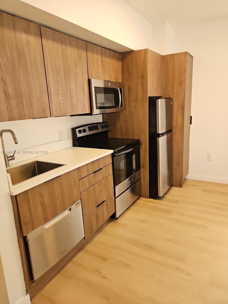Spacious and well-maintained 1-bedroom, 1-bath residence in a charming boutique building in the heart of South Beach. This interior unit boasts a bright, open layout with vinyl flooring throughout, ample closet space, and a functional kitchen. Enjoy abundant natural light in a quiet setting just steps from Lincoln Road, Flamingo Park, restaurants, shopping, and public transportation, with easy access to the beach and major roadways. One assigned outdoor parking space included. Ideal for embracing the quintessential Miami Beach lifestyle.Seller financing Available